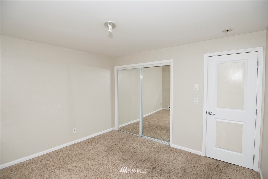 604 North 3rd Street, Unit 7 Tacoma, WA 98403 - Photo 9 of 11 a view of an empty room