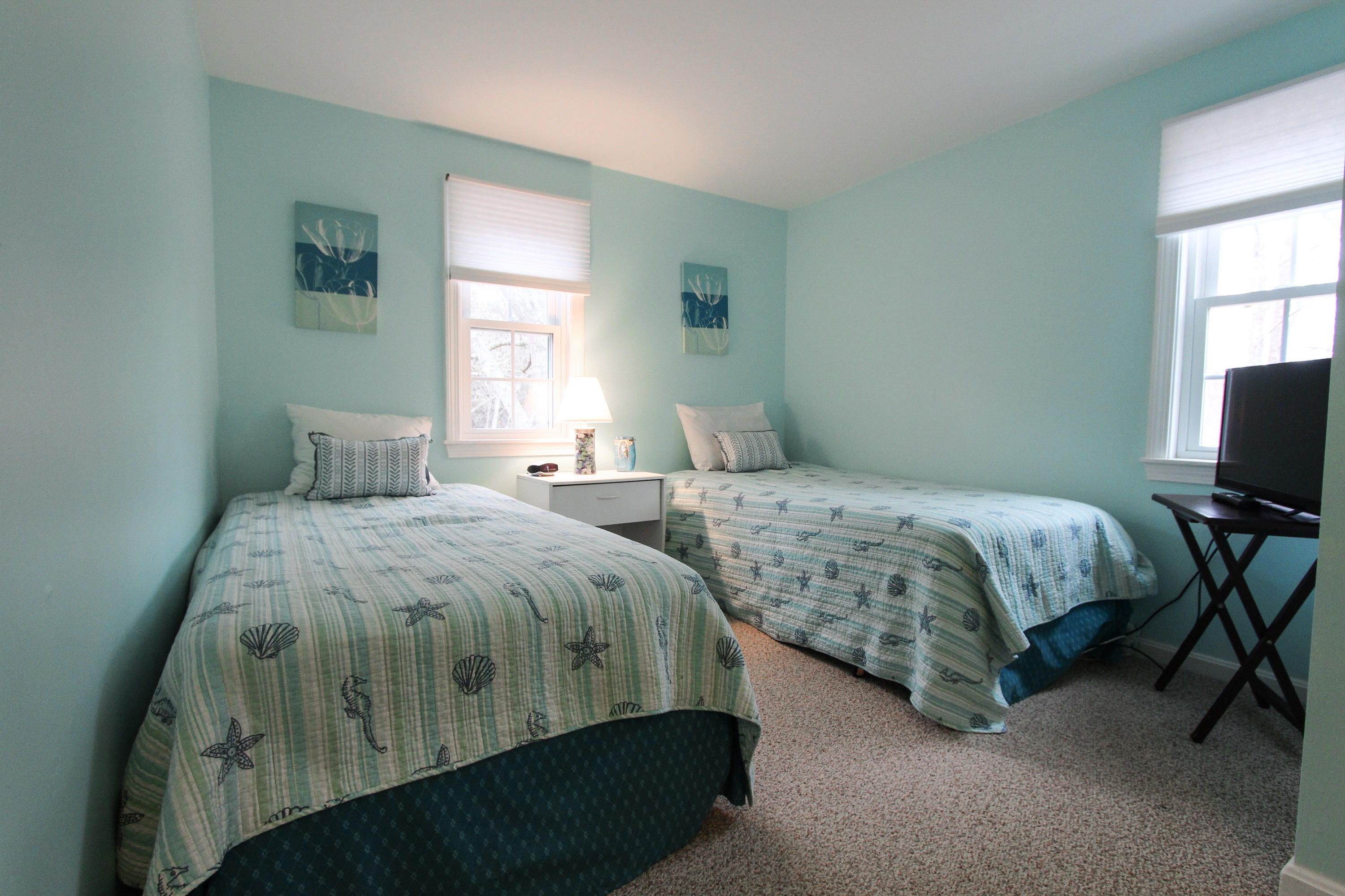 38 Putter Lane Hyannis, MA 02601 - Photo 24 of 30 a bedroom with a bed and a window