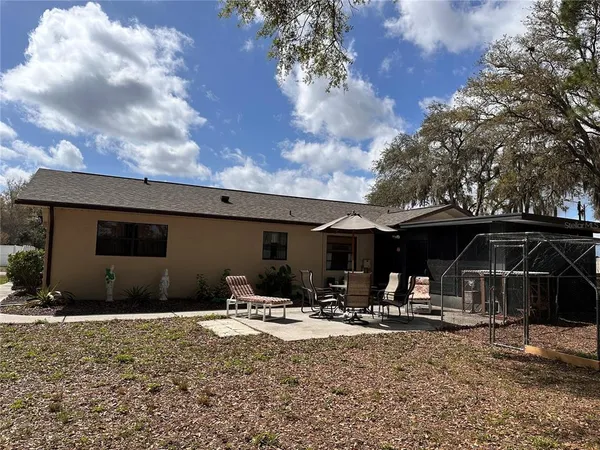 a view of the back yard of the house
