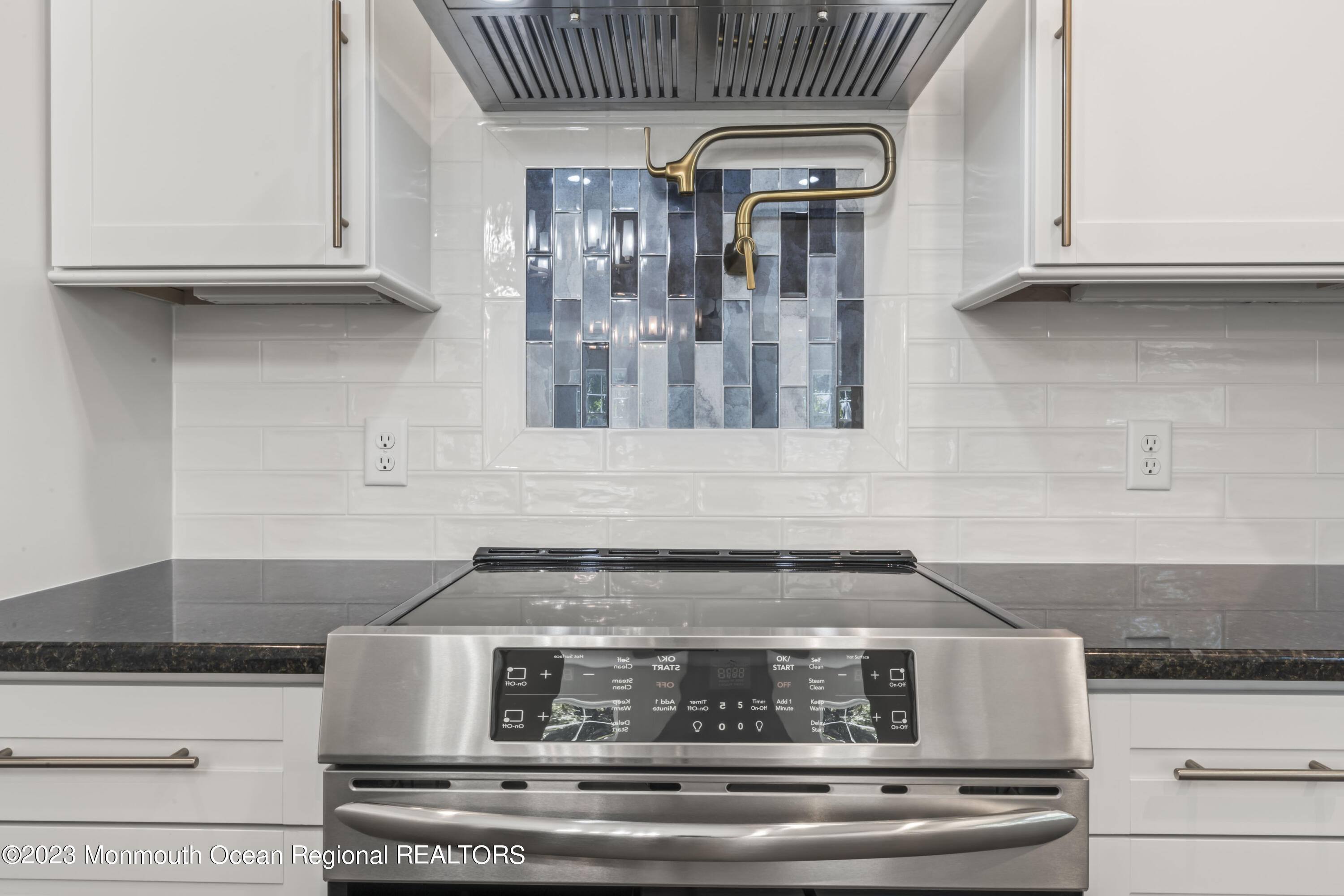 14 Patrick Court Toms River, NJ 08755 - Photo 18 of 30 a stove top oven sitting inside of a kitchen