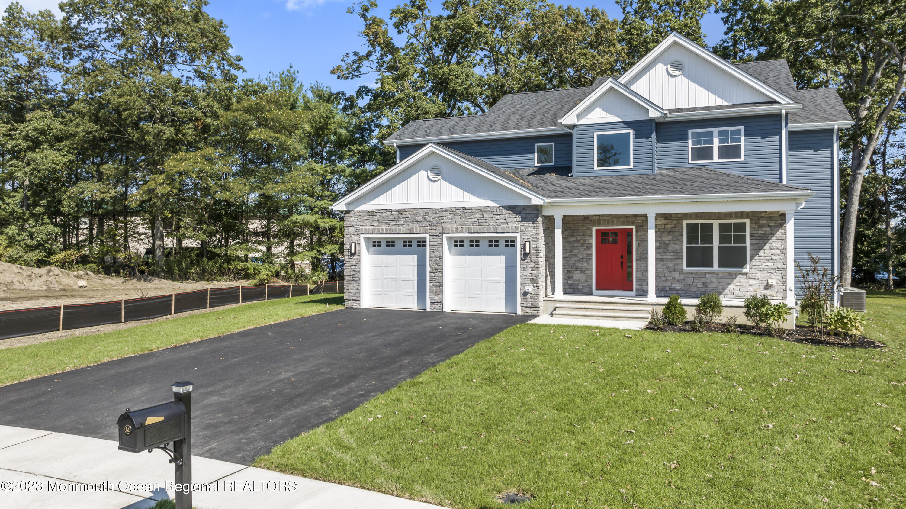 14 Patrick Court Toms River, NJ 08755 - Photo 2 of 30 a front view of a house with a yard and porch