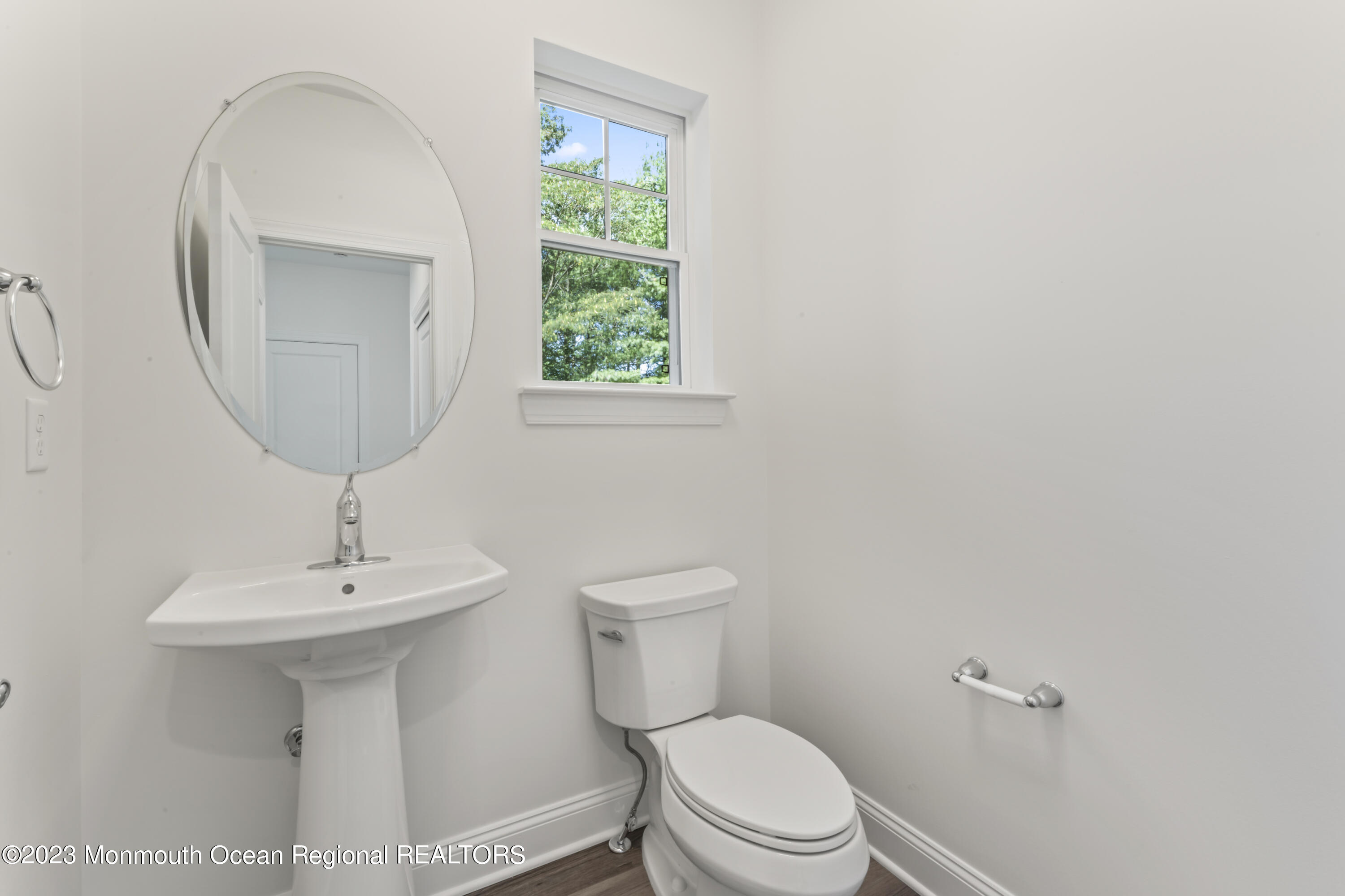 14 Patrick Court Toms River, NJ 08755 - Photo 5 of 30 a bathroom with a toilet a sink and a mirror