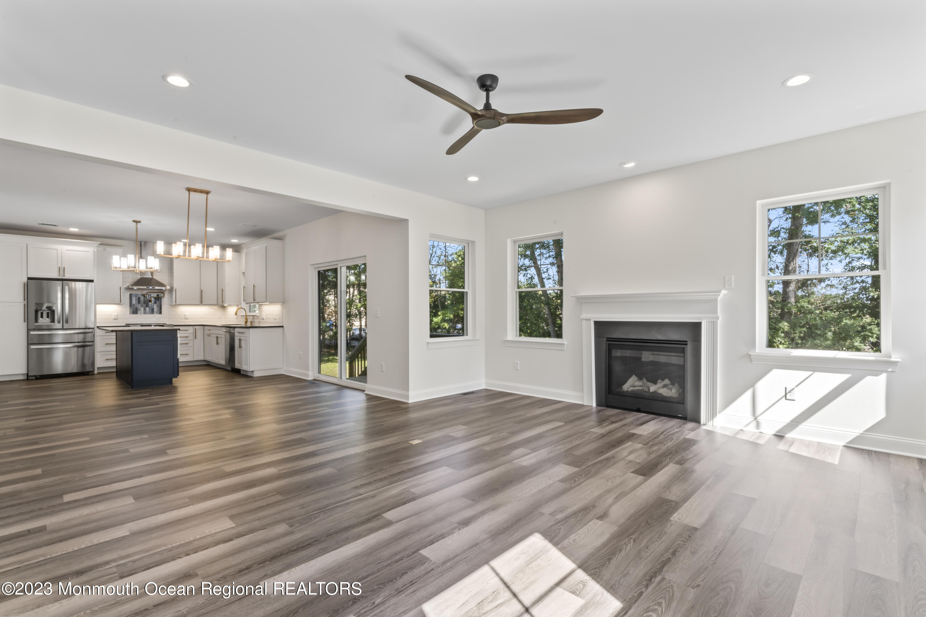 14 Patrick Court Toms River, NJ 08755 - Photo 7 of 30 a view of an empty room with a fireplace and a window
