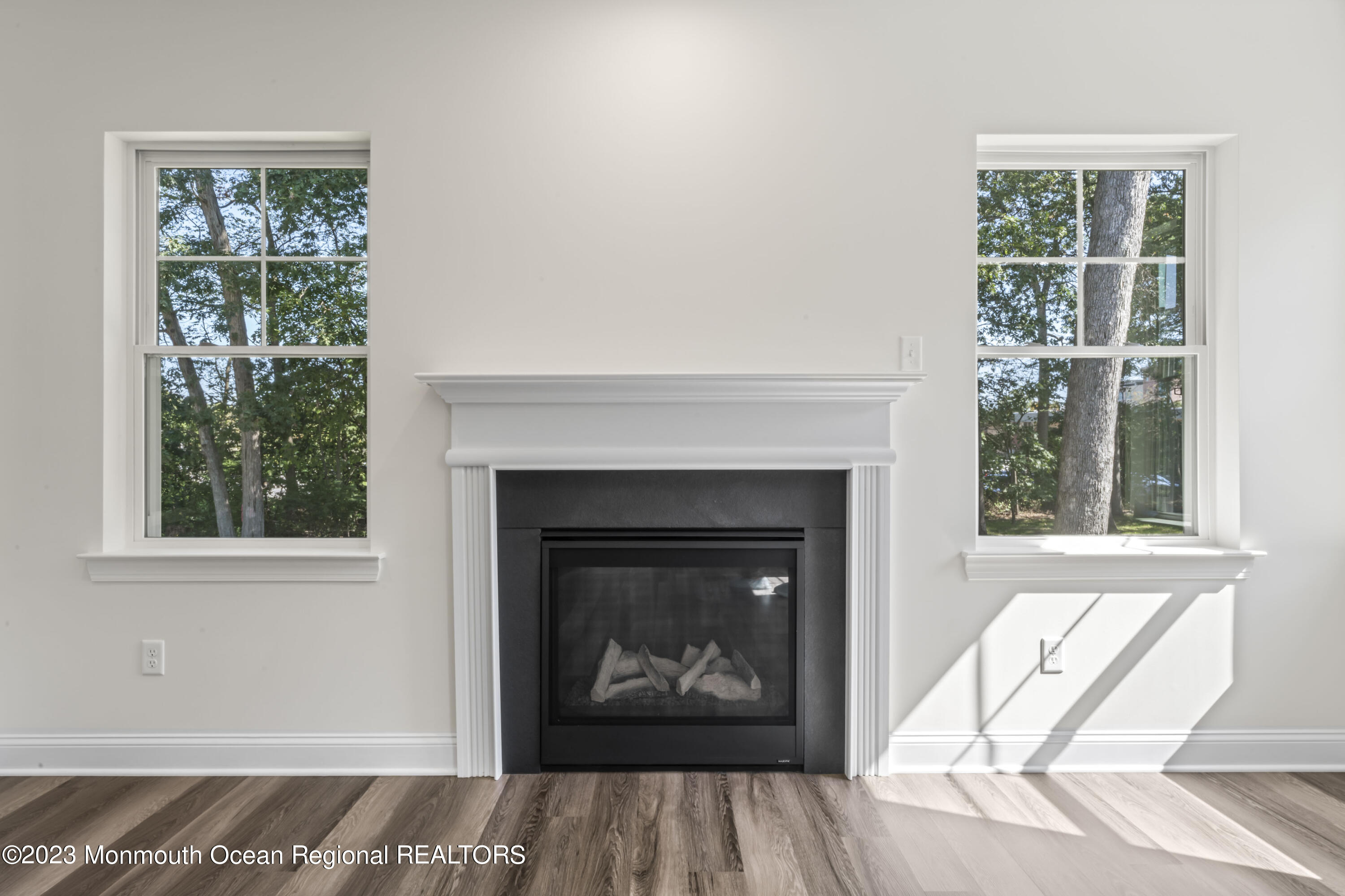 14 Patrick Court Toms River, NJ 08755 - Photo 9 of 30 a living room with a fireplace and a window
