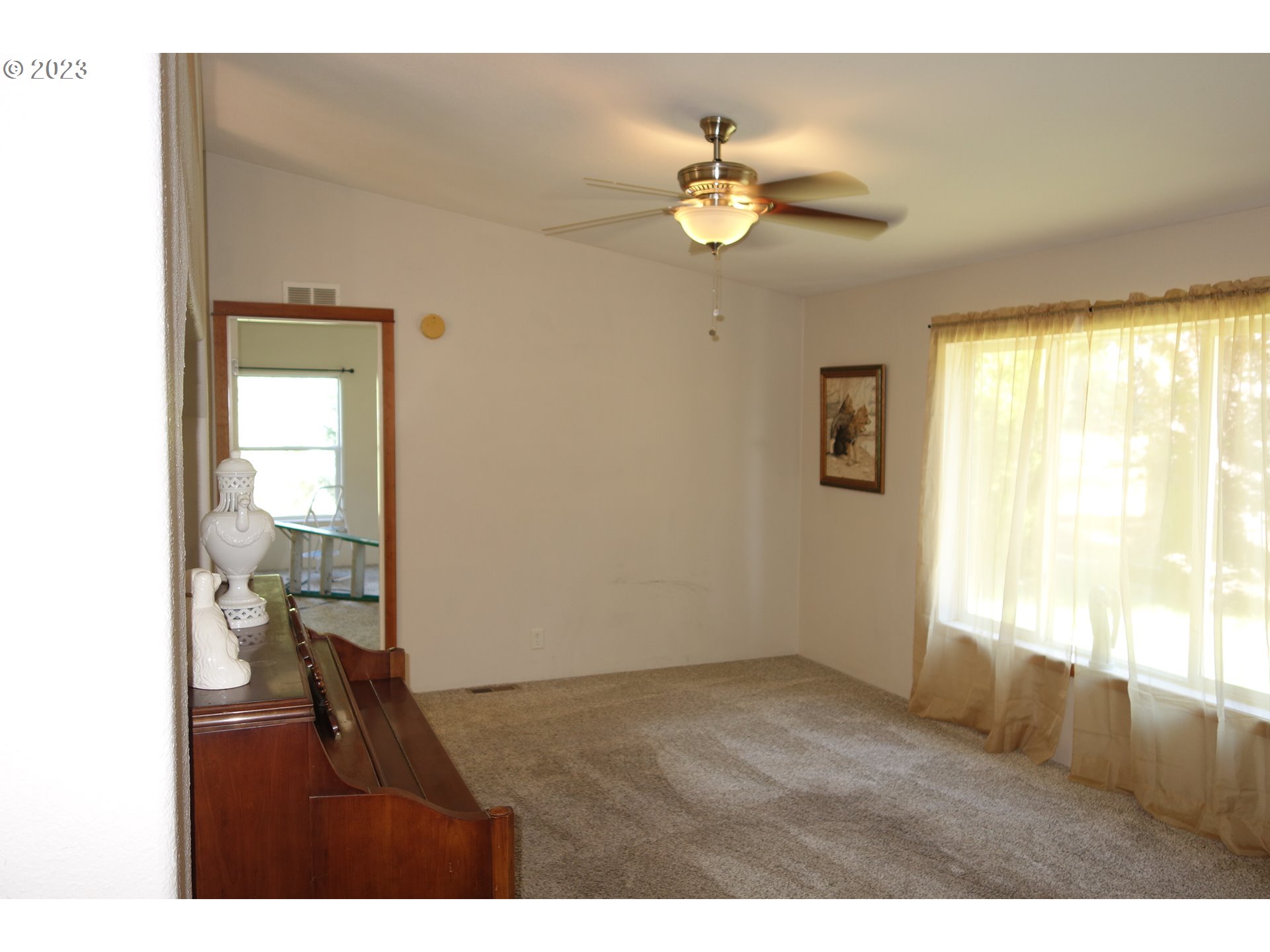 182 Bates Road White Salmon, WA 98672 - Photo 14 of 38 a view of an empty room and window