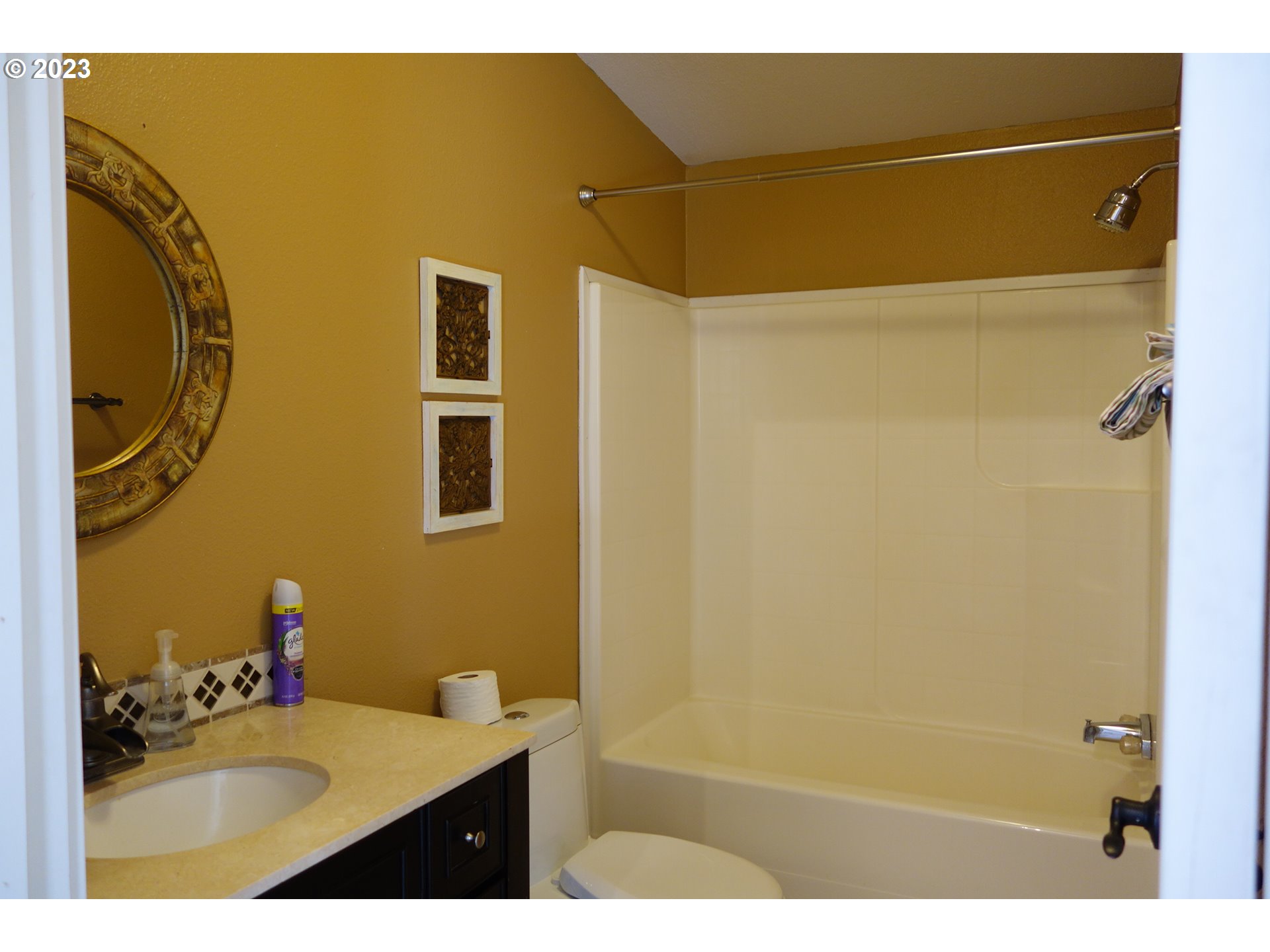 182 Bates Road White Salmon, WA 98672 - Photo 23 of 38 a bathroom with a sink and a mirror