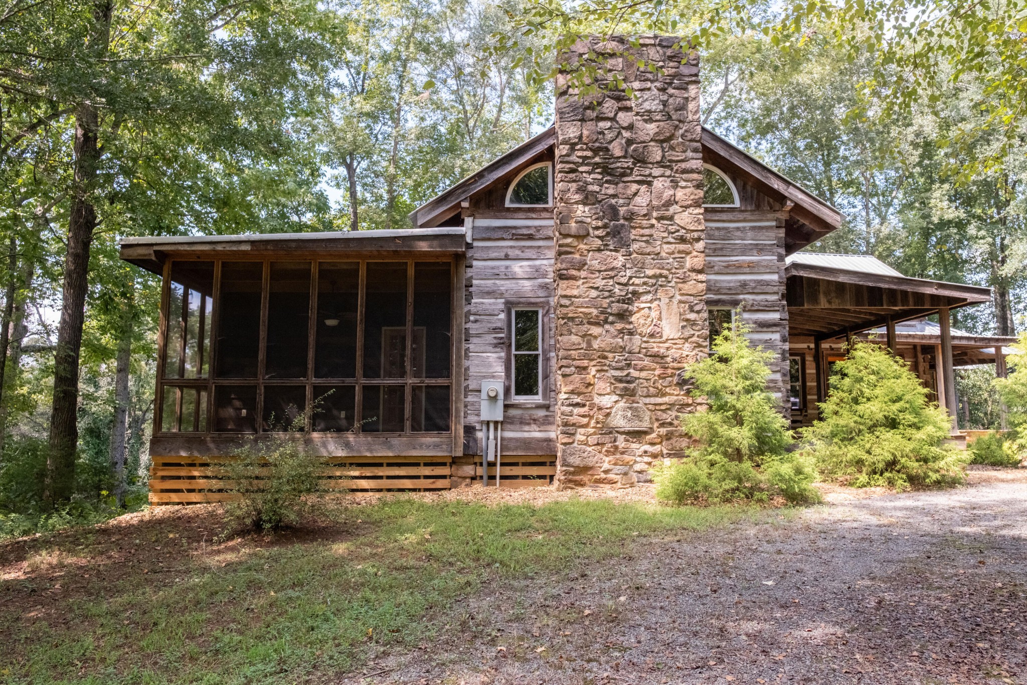 4340 Holland Chattoogaville Road Lyerly, GA 30730 - Photo 9 of 47 a front view of a house with garden