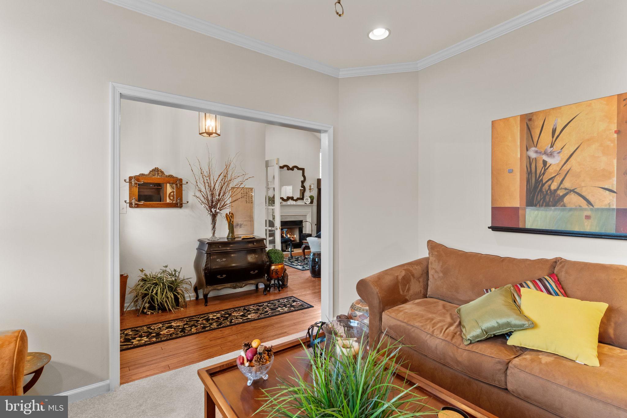 613 Bellflower Road Langhorne, PA 19047 - Photo 14 of 28 a living room with furniture and wooden floor