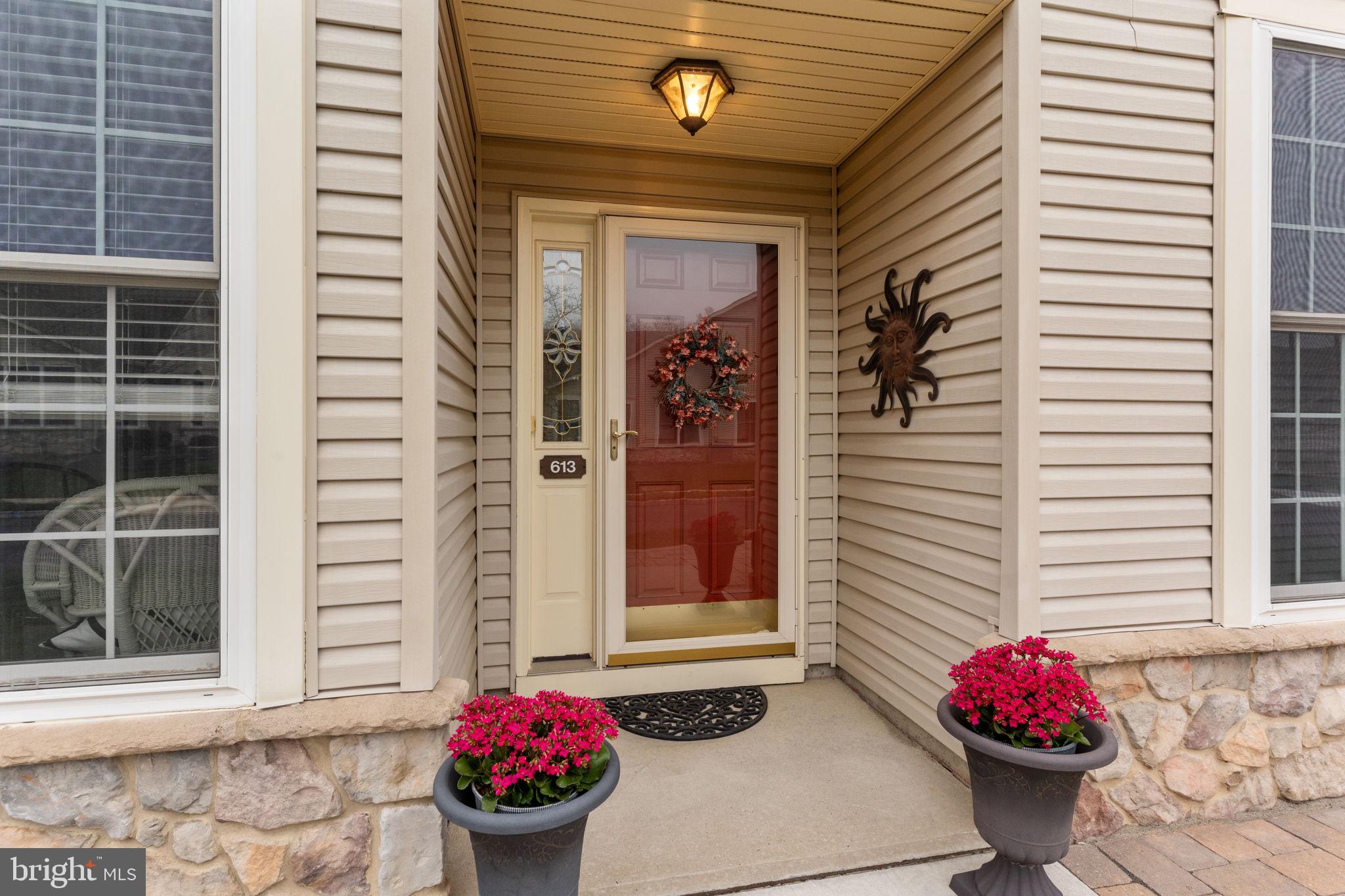 613 Bellflower Road Langhorne, PA 19047 - Photo 3 of 28 a front view of a house with a potted plant