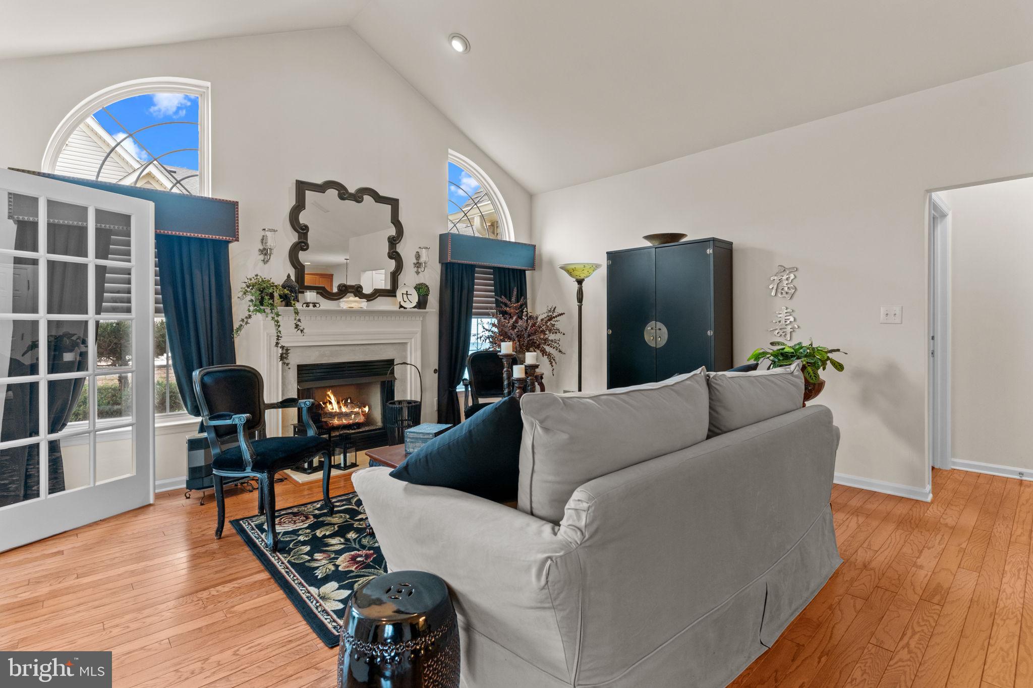 613 Bellflower Road Langhorne, PA 19047 - Photo 5 of 28 a living room with furniture and a fireplace
