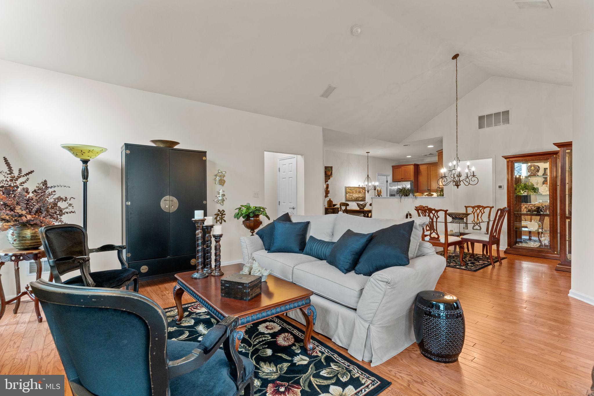 613 Bellflower Road Langhorne, PA 19047 - Photo 6 of 28 a living room with furniture and wooden floor