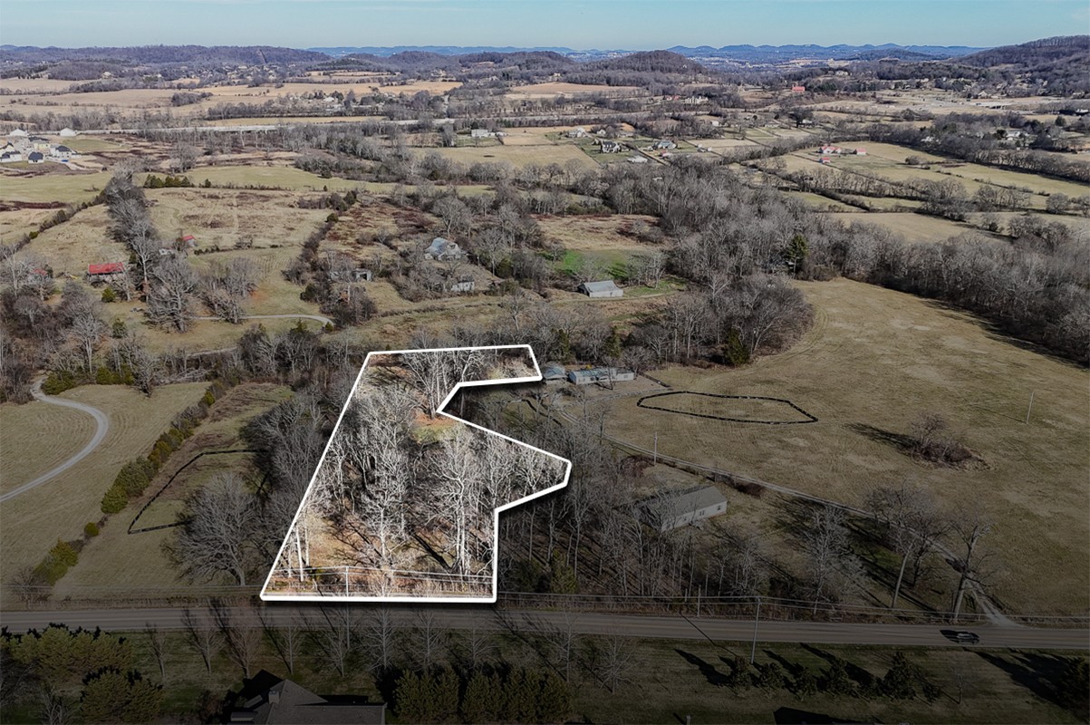 2754 Critz Lane Thompson's Station, TN 37179 - Photo 1 of 5 an aerial view of residential houses with outdoor space