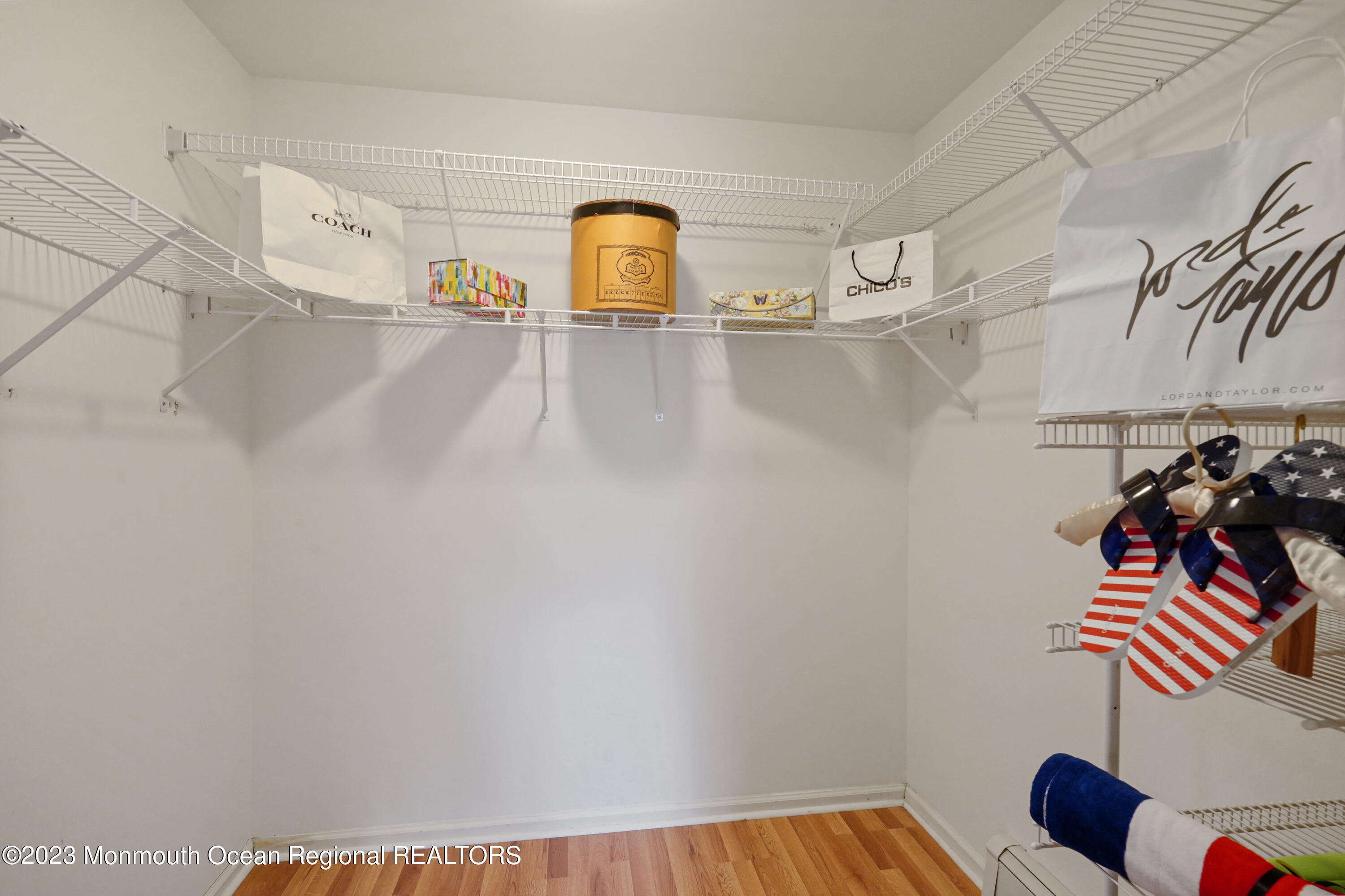 7 Portebello Road Jackson, NJ 08527 - Photo 27 of 49 a view of storage and utility room with racks on the wall