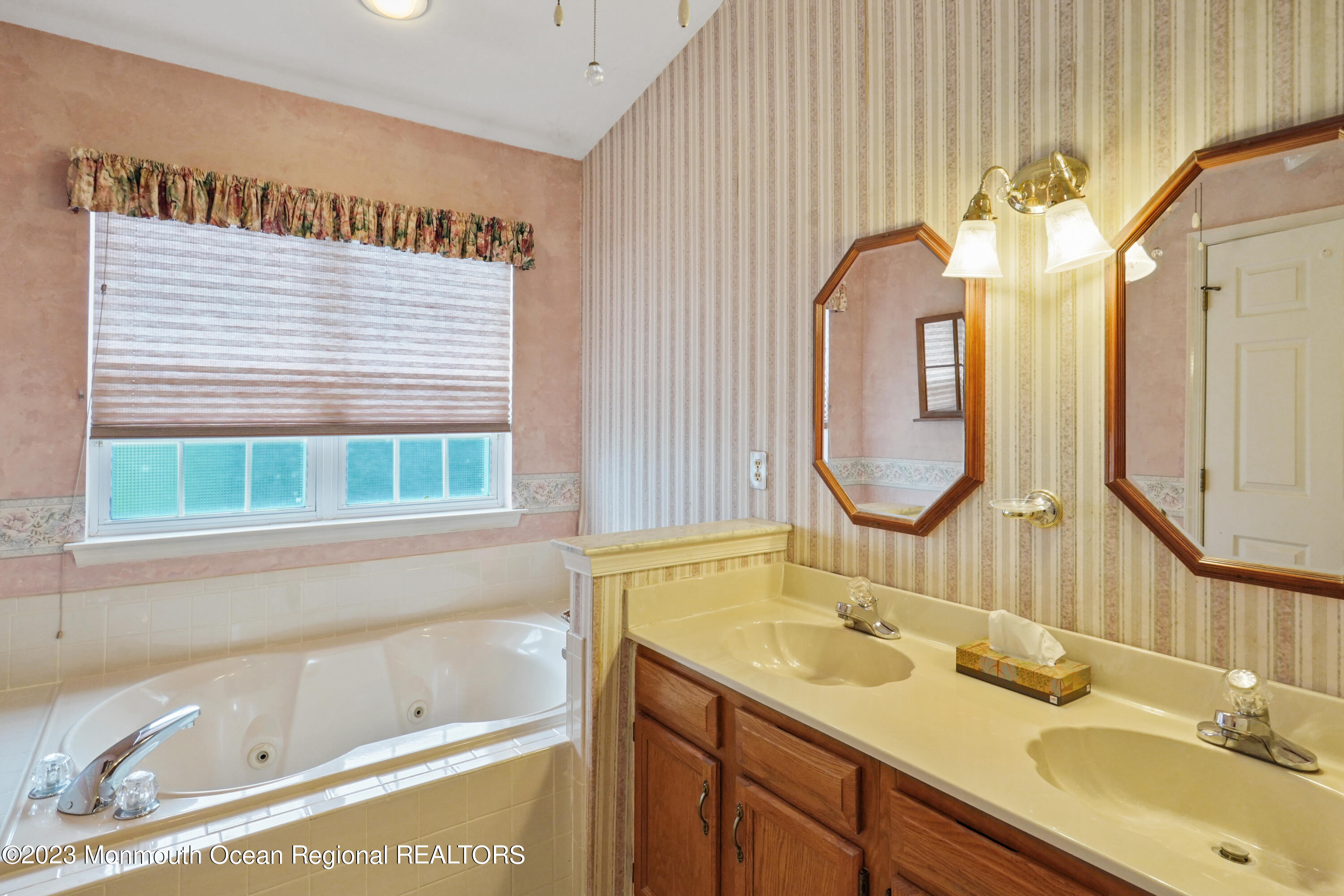 7 Portebello Road Jackson, NJ 08527 - Photo 28 of 49 a bathroom with a sink and a mirror