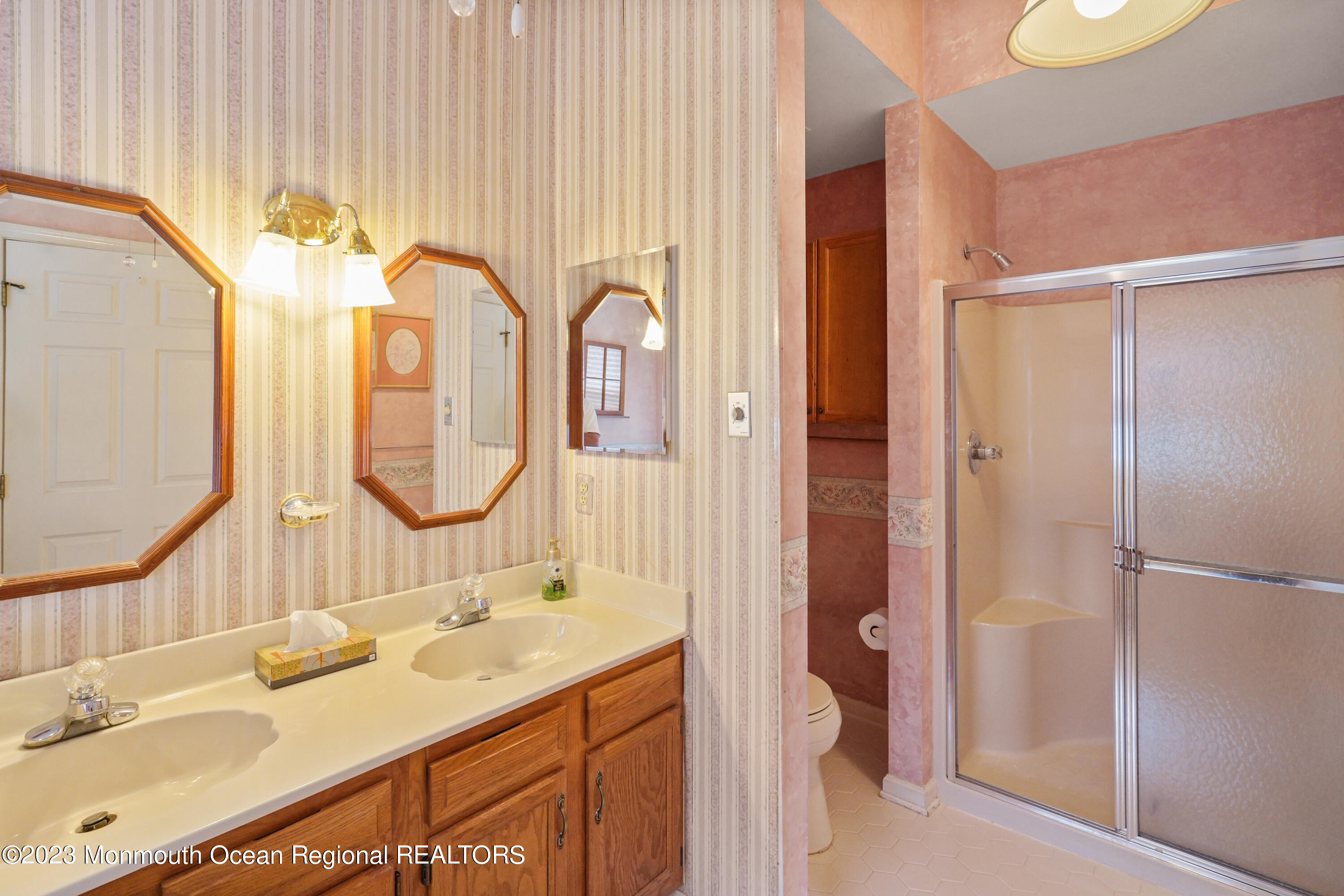 7 Portebello Road Jackson, NJ 08527 - Photo 29 of 49 a bathroom with a double vanity sink and a mirror