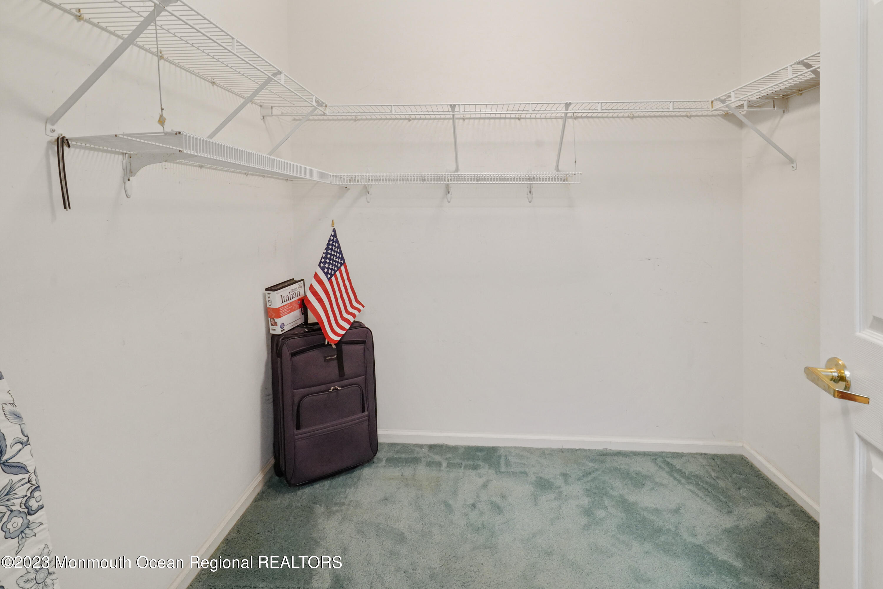 7 Portebello Road Jackson, NJ 08527 - Photo 33 of 49 a view of a room with racks on the wall