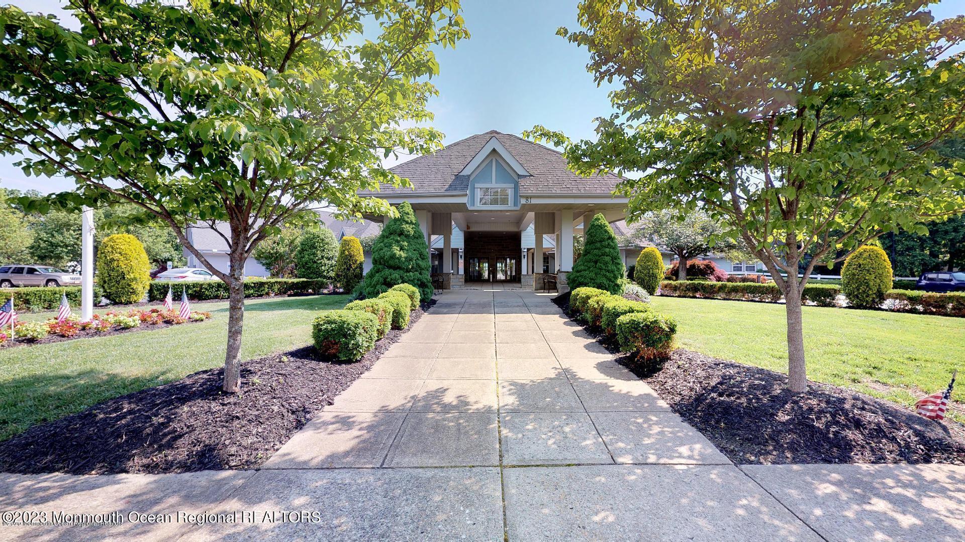 7 Portebello Road Jackson, NJ 08527 - Photo 35 of 49 a front view of a house with garden and porch