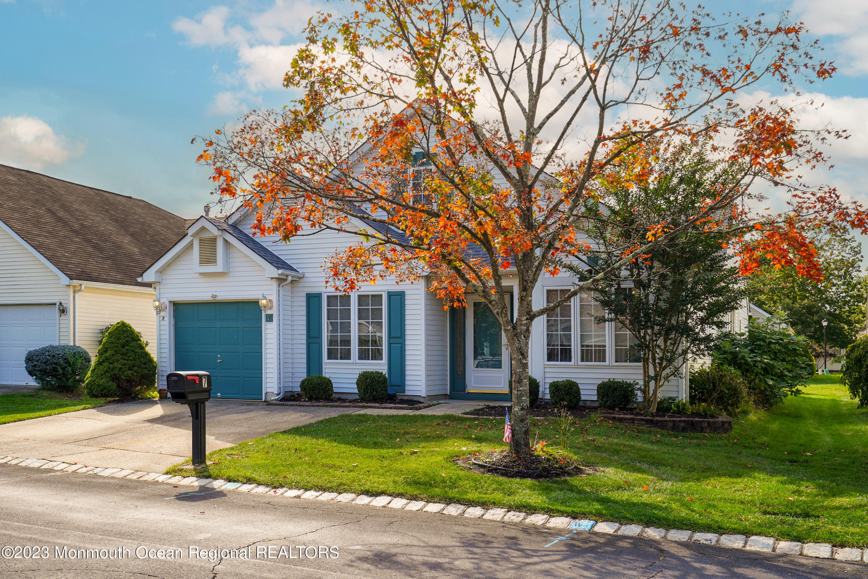 7 Portebello Road Jackson, NJ 08527 - Photo 4 of 49 a front view of a house with a yard and garage