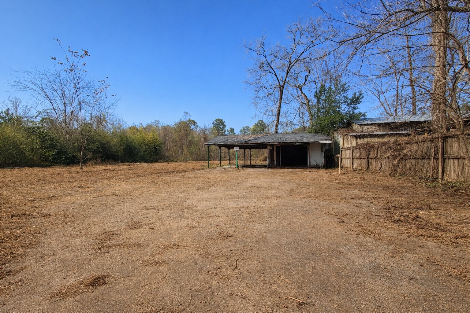 274 County Road 3945 Colmesneil, TX 75938 - Photo 7 of 13 a view of a big yard with wooden fence