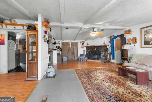 a bedroom with a bed and cabinets