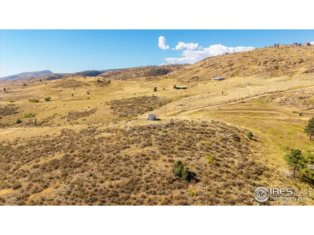 a picture of floor to ceiling window and beach
