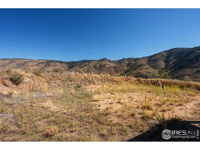 a black and white photo of a road