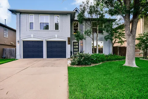 a front view of house with yard