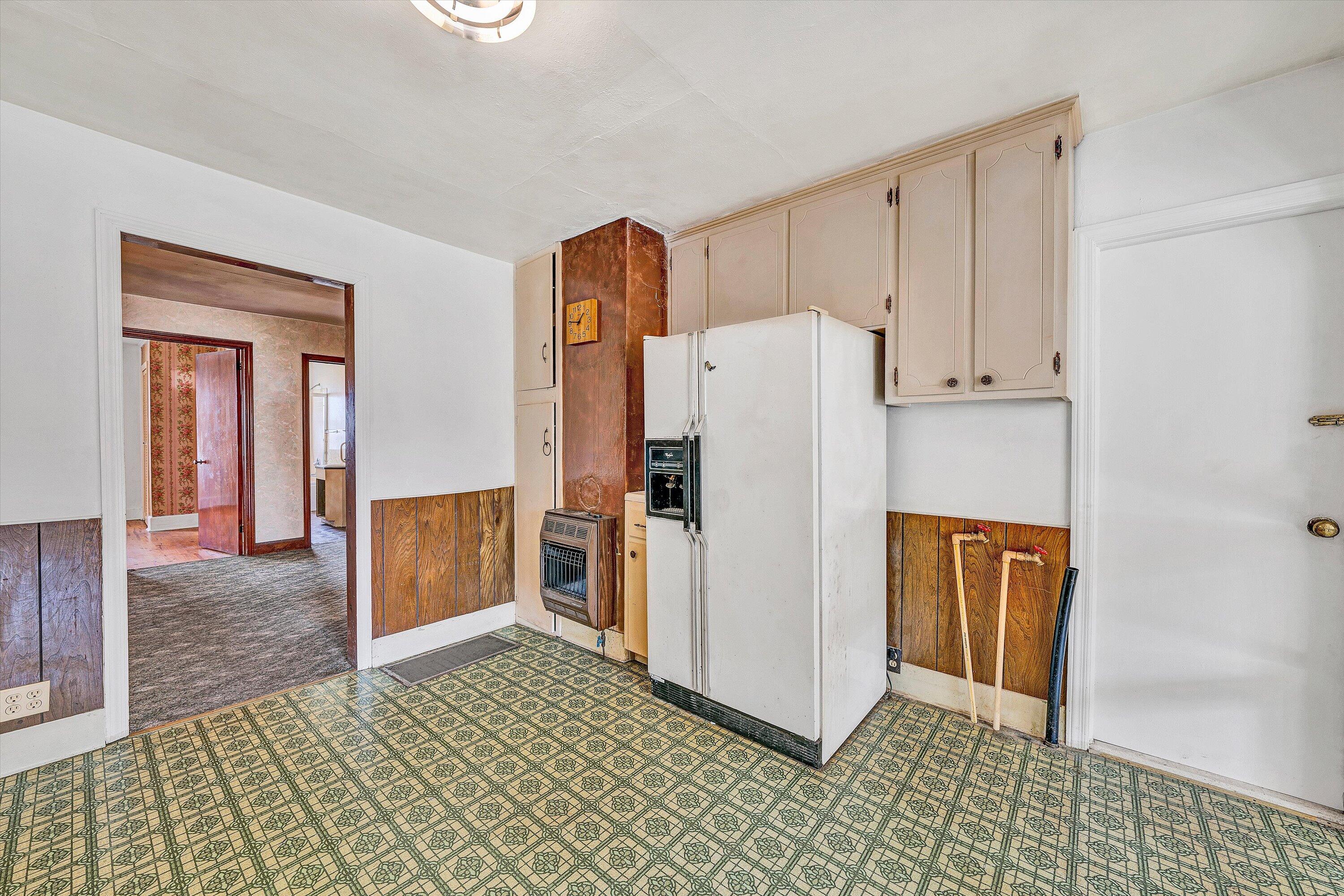 3145 Doe Run Road Rocky Mount, VA 24151 - Photo 12 of 38 a view of a kitchen with refrigerator and cabinet