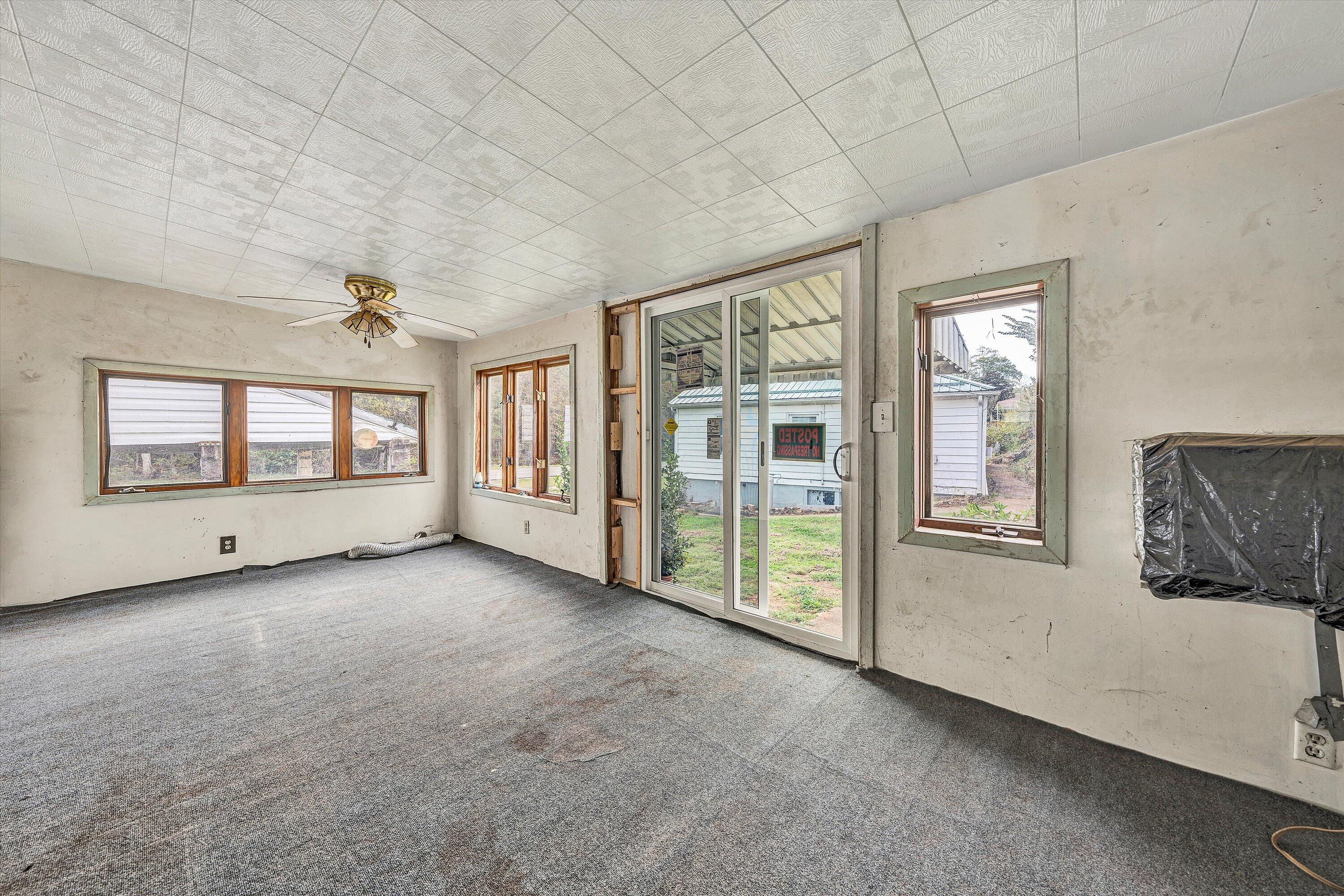 3145 Doe Run Road Rocky Mount, VA 24151 - Photo 22 of 38 an empty room with windows