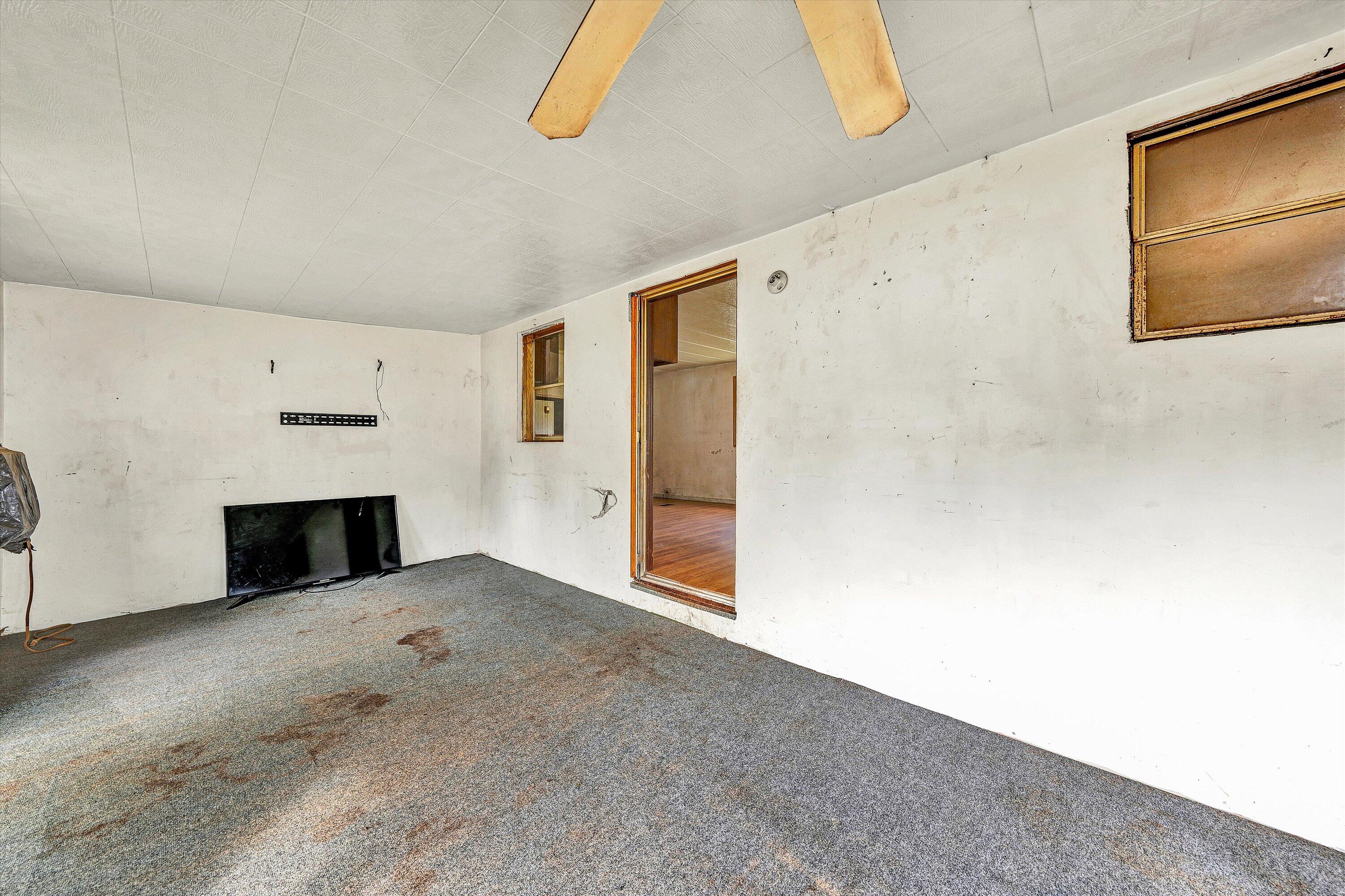 3145 Doe Run Road Rocky Mount, VA 24151 - Photo 23 of 38 a view of empty room with a fireplace