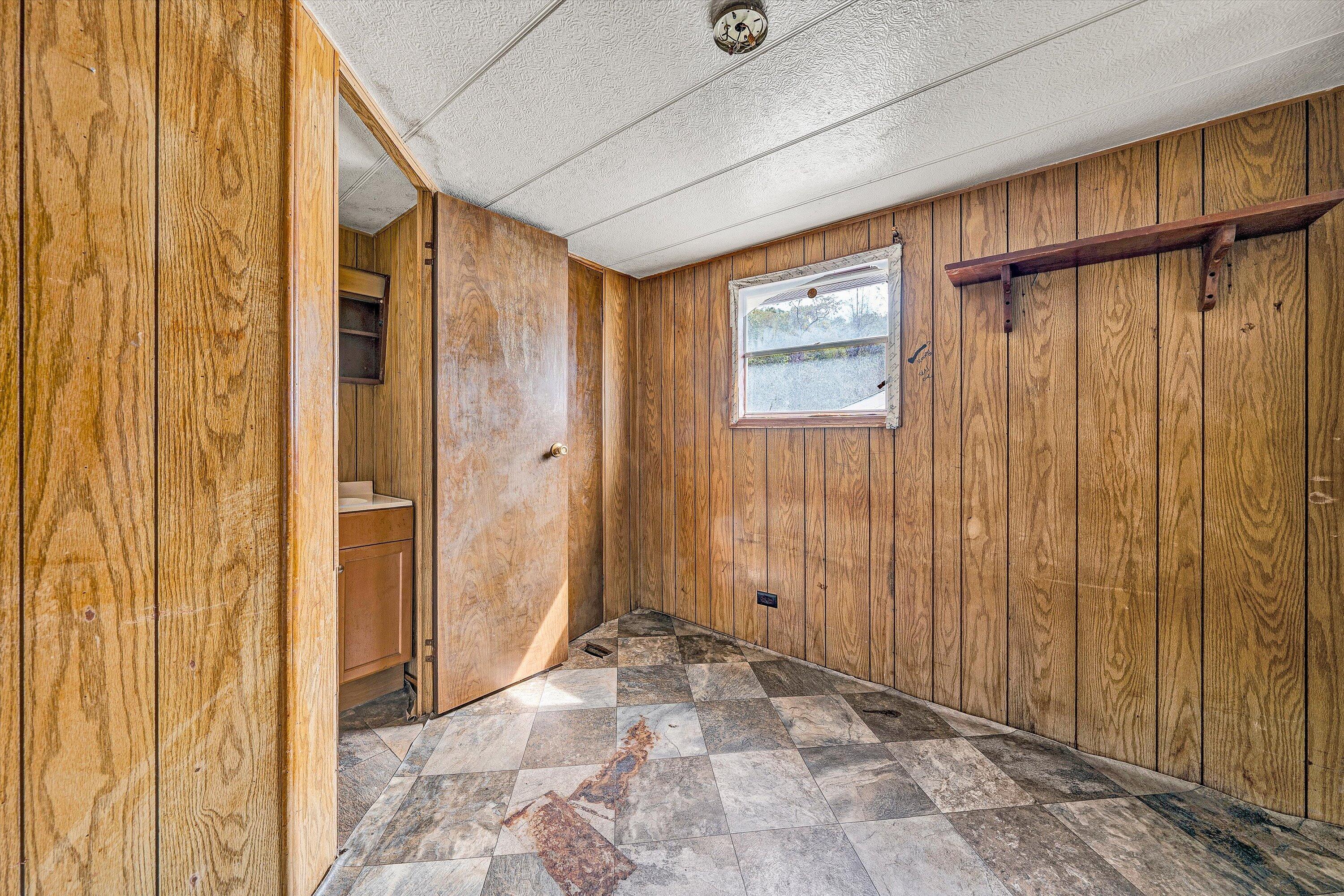 3145 Doe Run Road Rocky Mount, VA 24151 - Photo 30 of 38 a view of a bathroom with shower and a sink