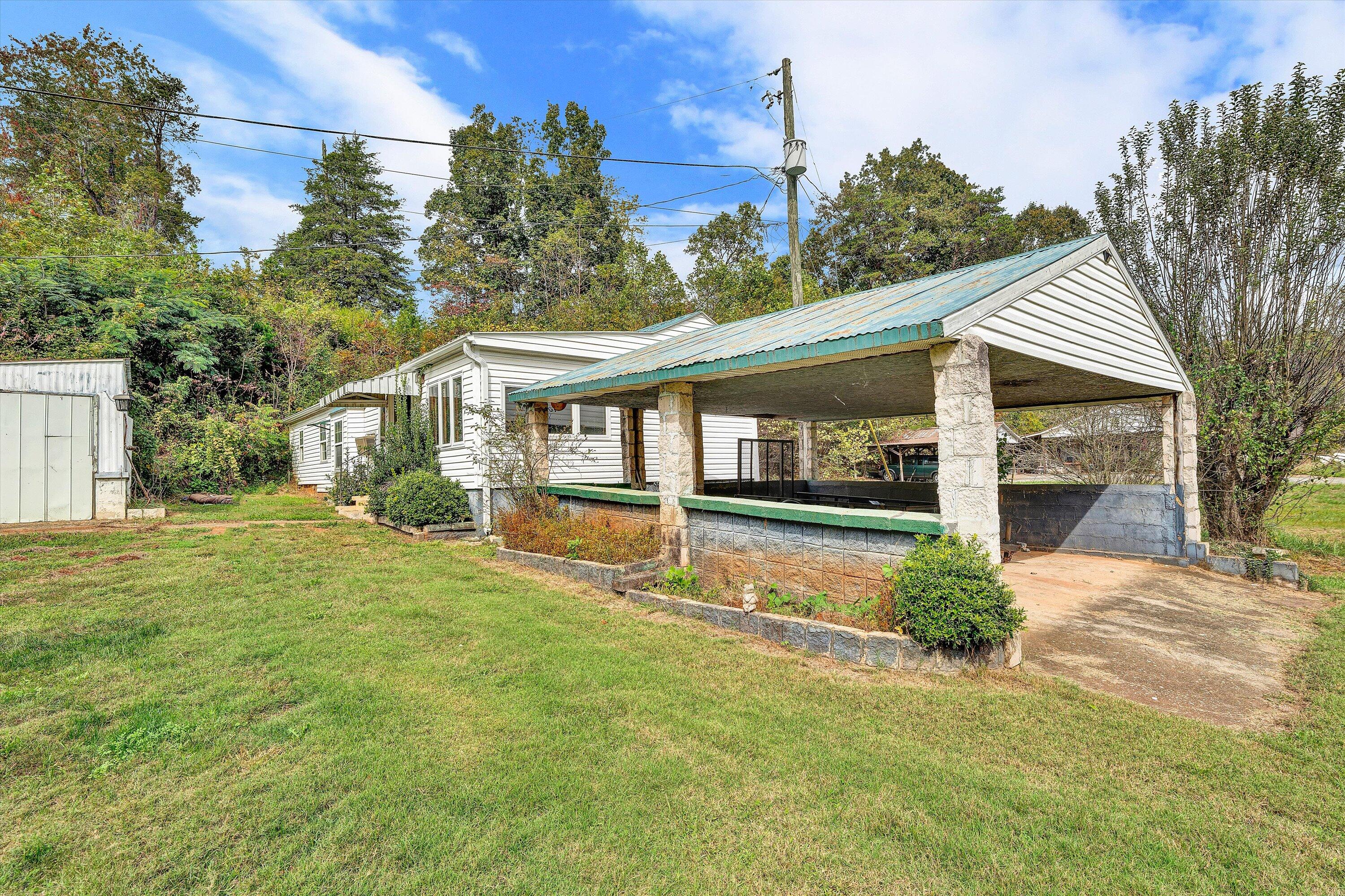 3145 Doe Run Road Rocky Mount, VA 24151 - Photo 35 of 38 front view of a house with a yard
