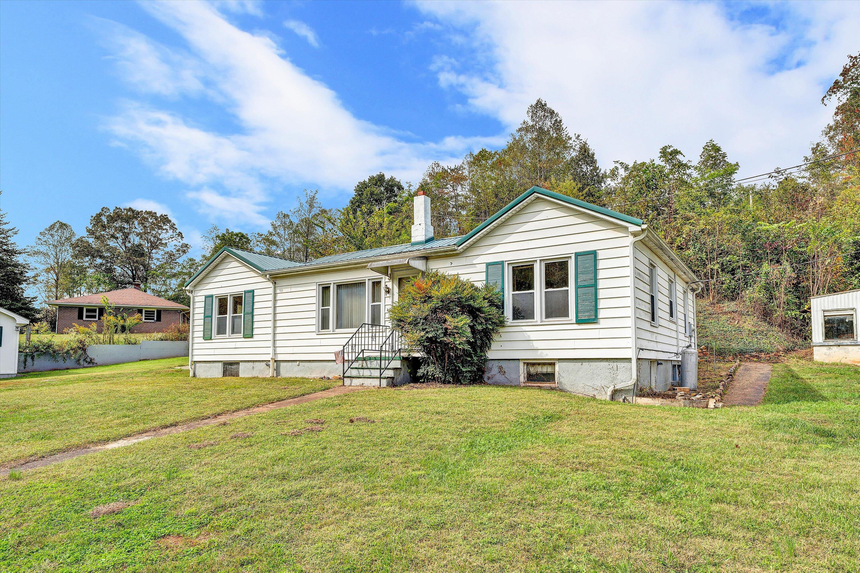 3145 Doe Run Road Rocky Mount, VA 24151 - Photo 38 of 38 a front view of house with yard and green space