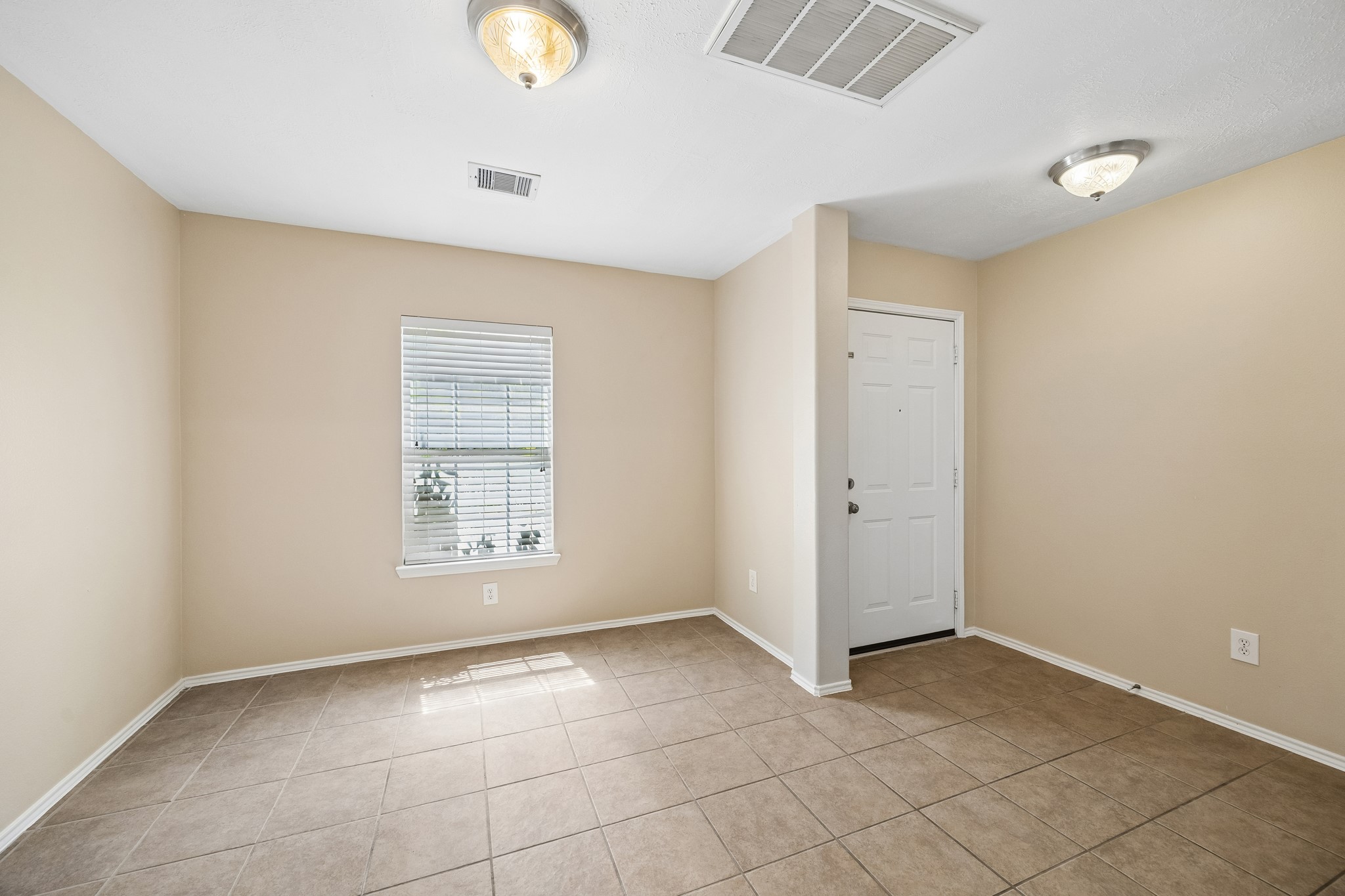 20110 Saddle Ranch Drive Humble, TX 77338 - Photo 6 of 15 Formal dining room by entry