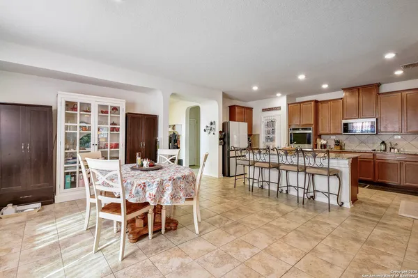 a view of a dining room kitchen and a window