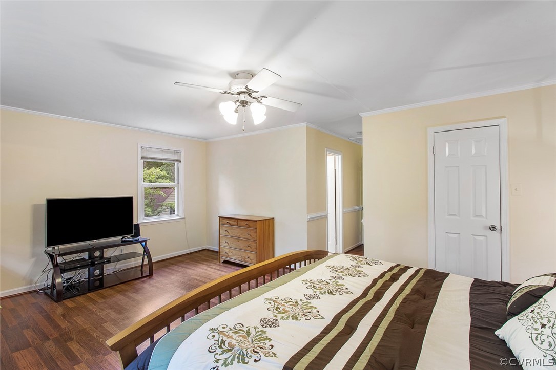 12930 South Chester Road Chester, VA 23831 - Photo 20 of 39 a bedroom with a bed and a flat screen tv