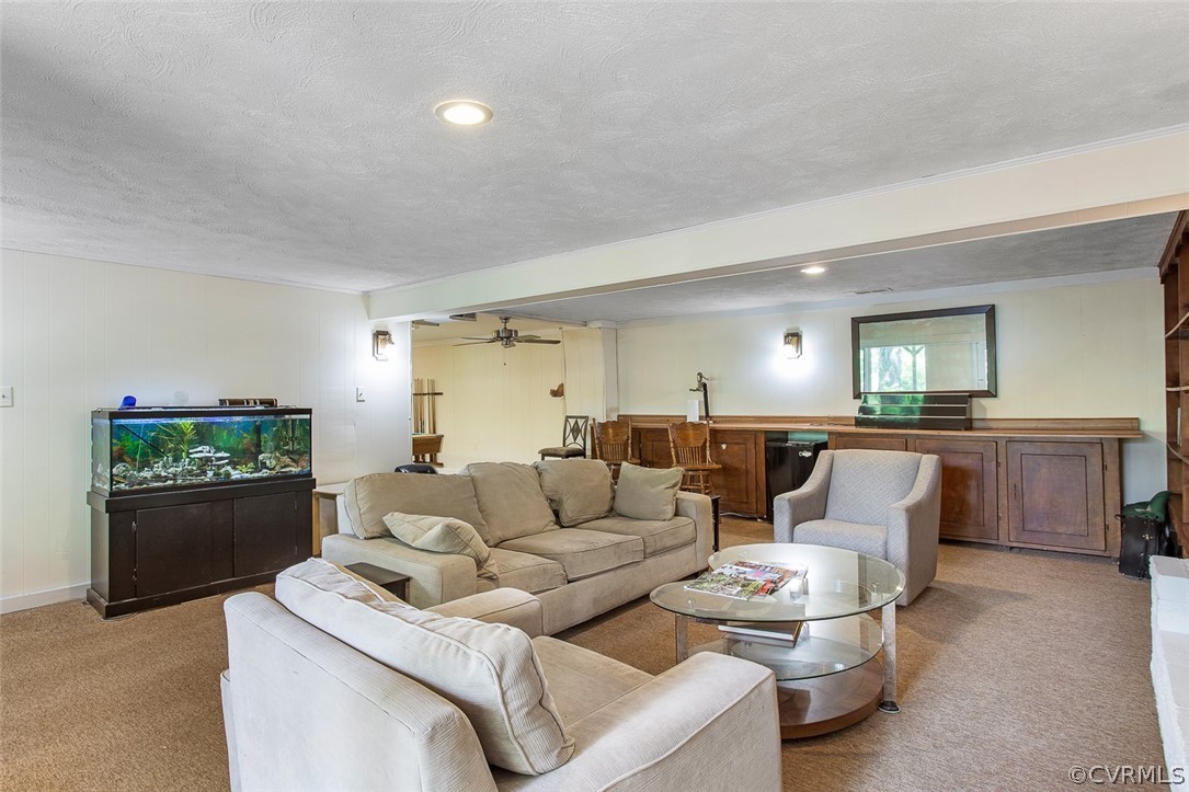 12930 South Chester Road Chester, VA 23831 - Photo 27 of 39 a living room with furniture and a wooden floor