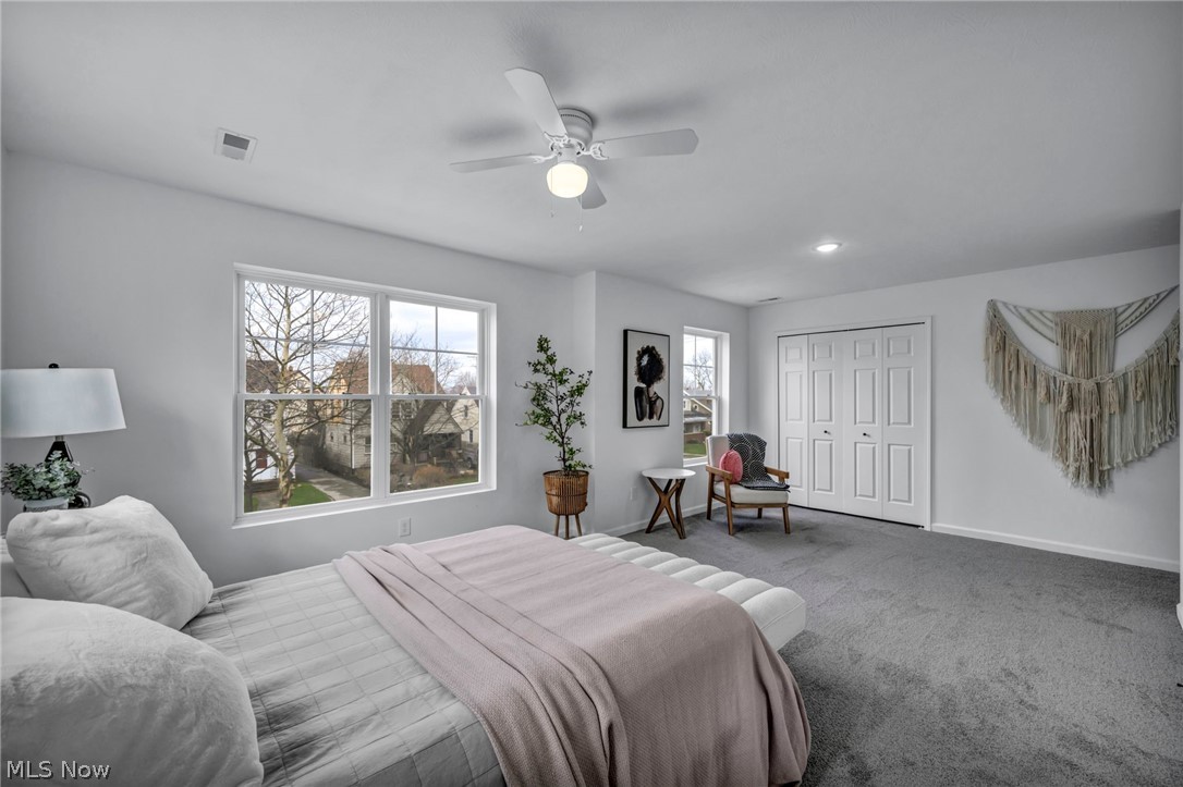 3633 Pennington Road Cleveland, OH 44120 - Photo 18 of 34 Bedroom featuring a closet, carpet flooring, ceiling fan, and recessed lighting