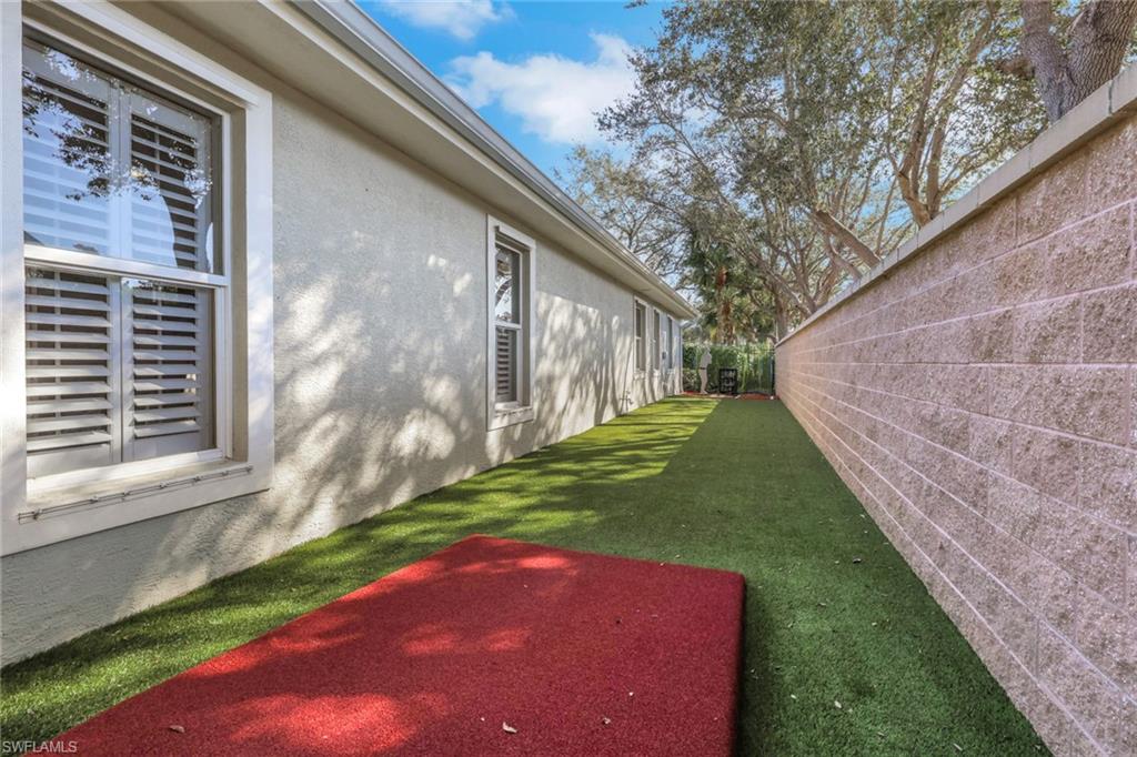 5074 Rustic Oaks Circle Naples, FL 34105 - Photo 35 of 38 View of yard