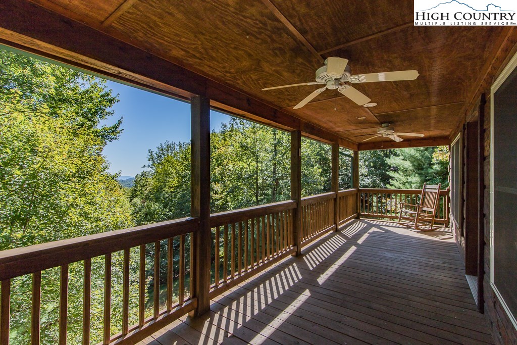 1074 Pepper Bush Road Purlear, NC 28665 - Photo 1 of 30 a view of a balcony with wooden floor