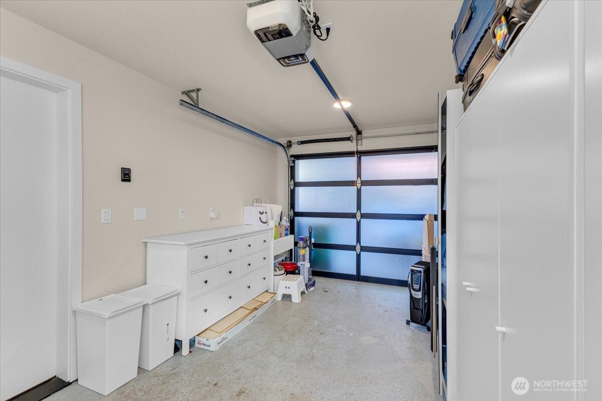 1602 East Marion Street Seattle, WA 98122 - Photo 21 of 28 a view of a room with shelves