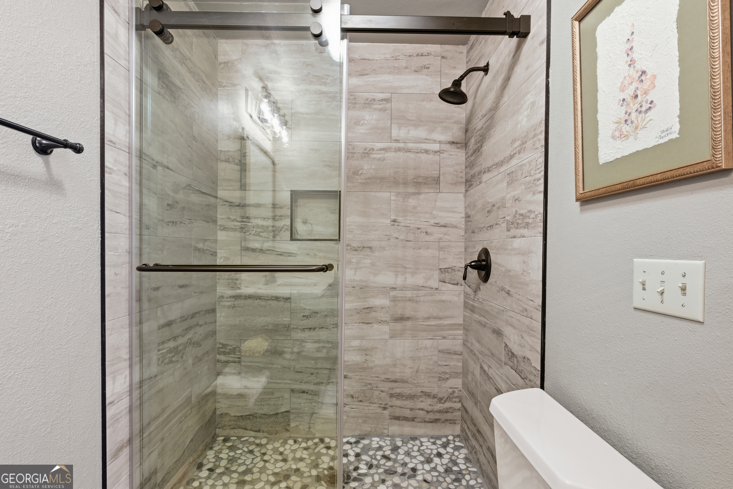 526 Grandaddy Still Road Scaly Mountain, NC 28775 - Photo 14 of 65 a bathroom with a shower and toilet