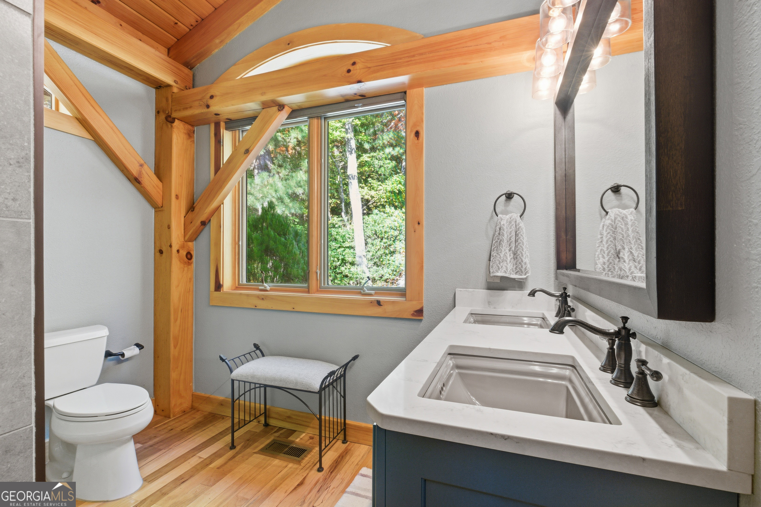 526 Grandaddy Still Road Scaly Mountain, NC 28775 - Photo 21 of 65 a bathroom with a sink a toilet and a mirror
