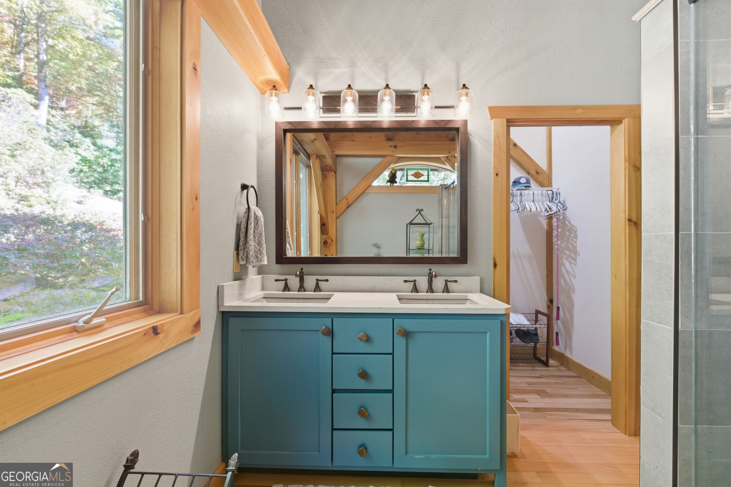 526 Grandaddy Still Road Scaly Mountain, NC 28775 - Photo 22 of 65 a bathroom with a sink and a mirror
