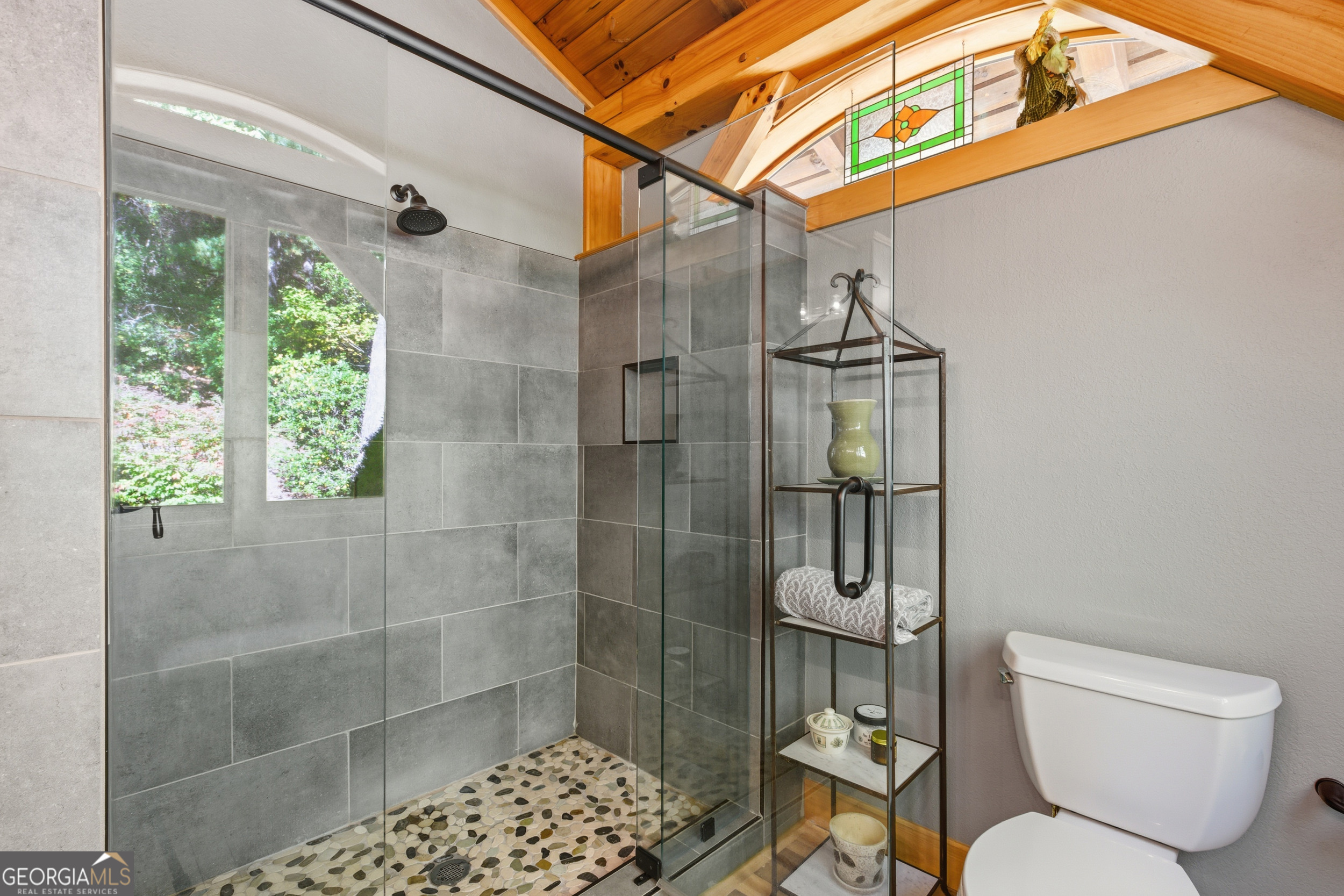 526 Grandaddy Still Road Scaly Mountain, NC 28775 - Photo 23 of 65 a bathroom with a toilet and shower