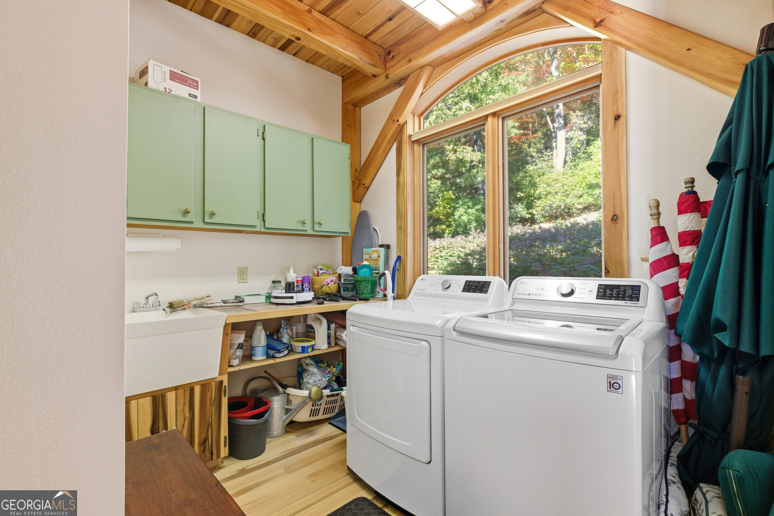 526 Grandaddy Still Road Scaly Mountain, NC 28775 - Photo 24 of 65 a utility room with dryer and washer