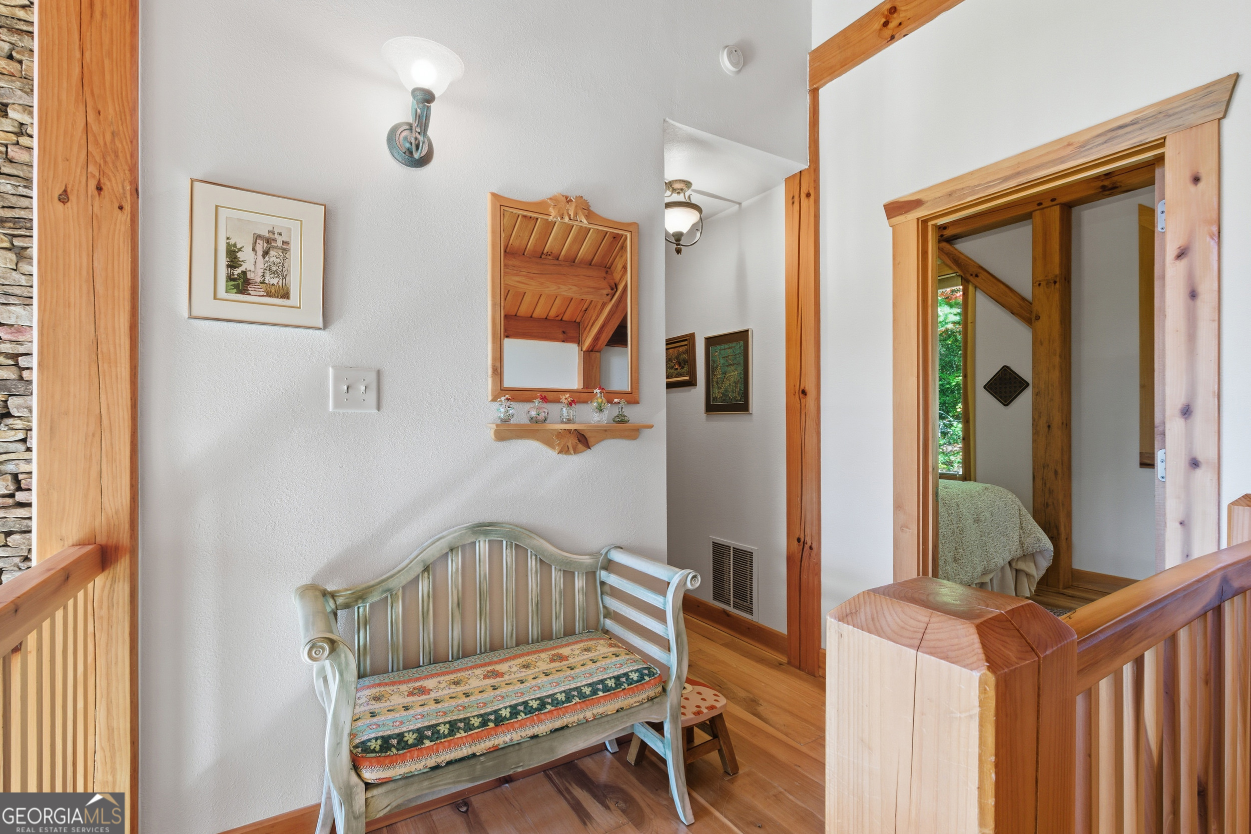 526 Grandaddy Still Road Scaly Mountain, NC 28775 - Photo 26 of 65 a bedroom with a bed and a dresser