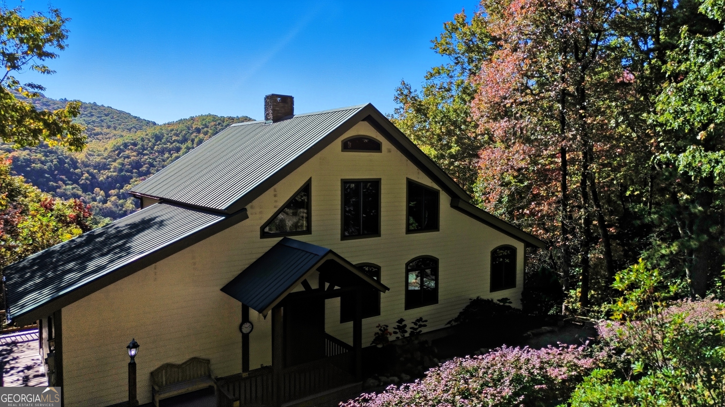526 Grandaddy Still Road Scaly Mountain, NC 28775 - Photo 34 of 65 a front view of a house with a yard
