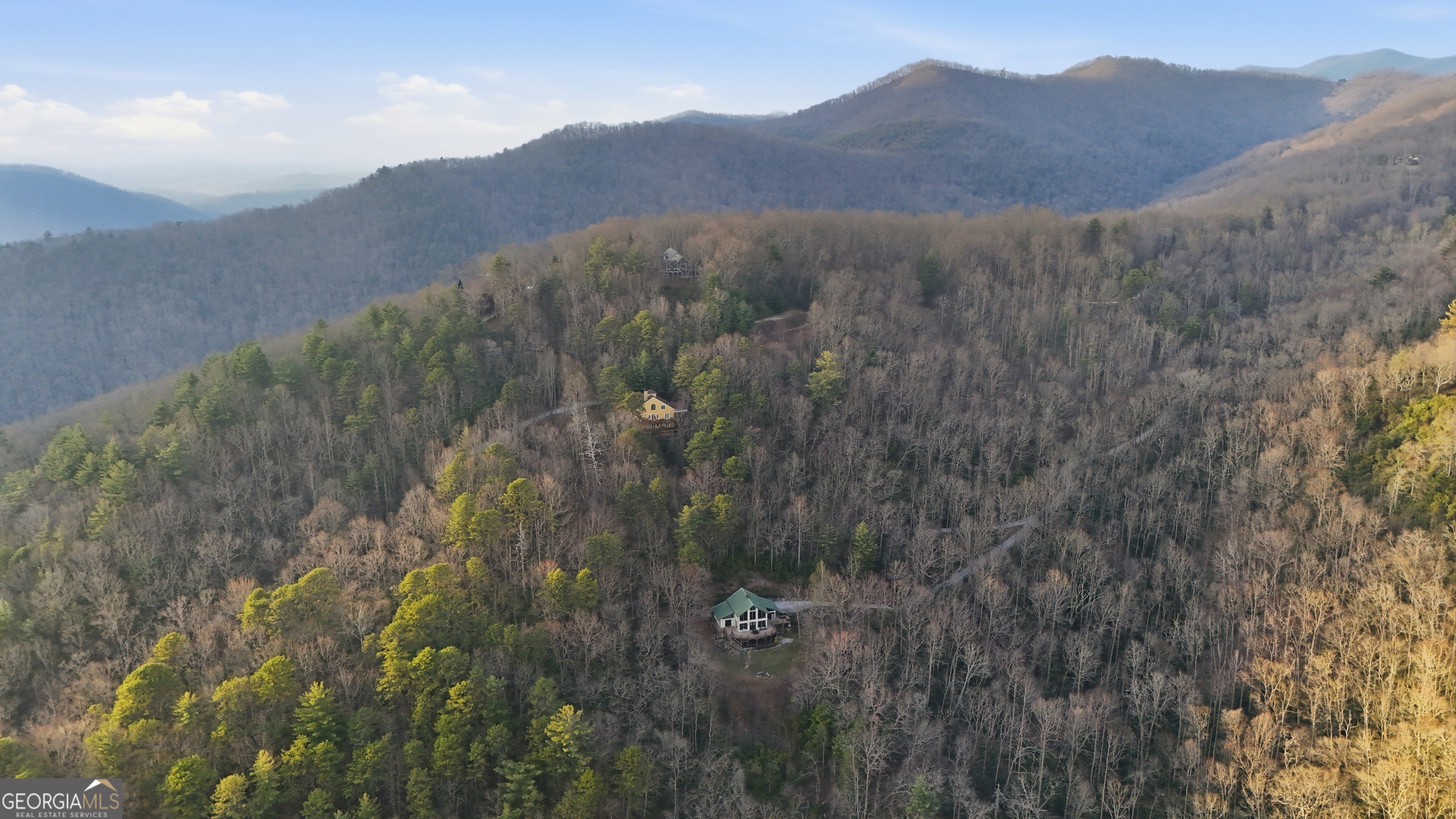 526 Grandaddy Still Road Scaly Mountain, NC 28775 - Photo 48 of 65 a view of a mountain range with trees in the background