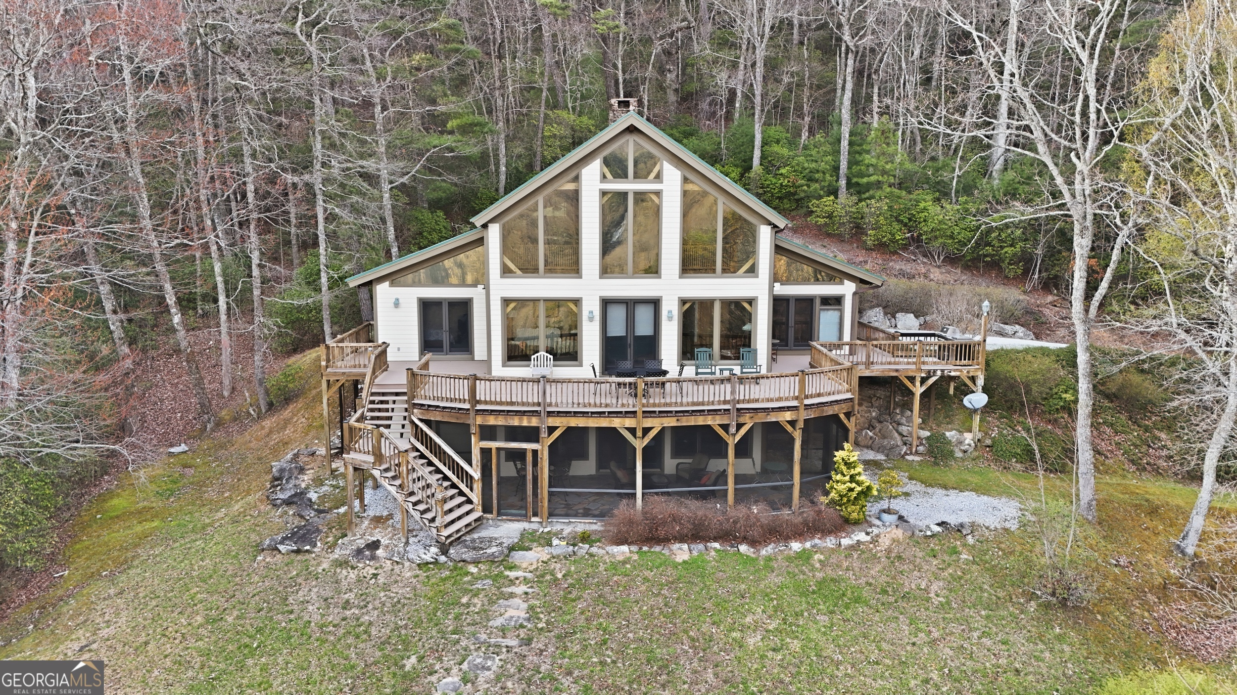 526 Grandaddy Still Road Scaly Mountain, NC 28775 - Photo 53 of 65 a house view with a garden space